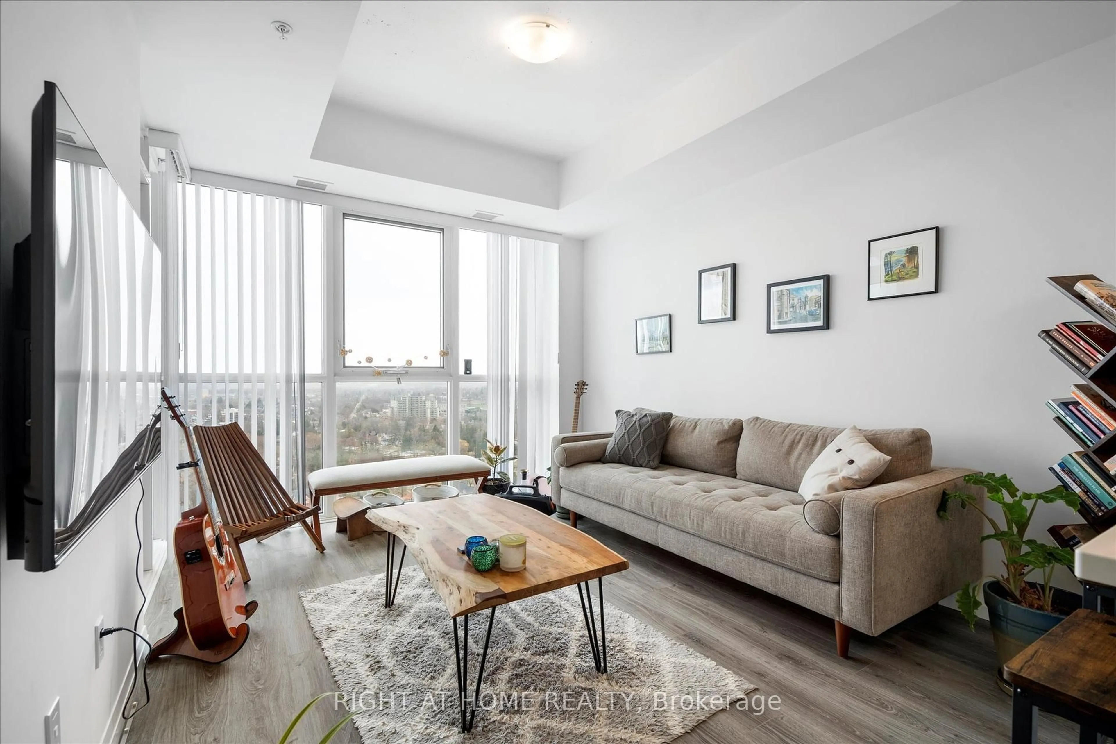 Living room with furniture, wood/laminate floor for 108 Garment St #2503, Kitchener Ontario N2G 0E2