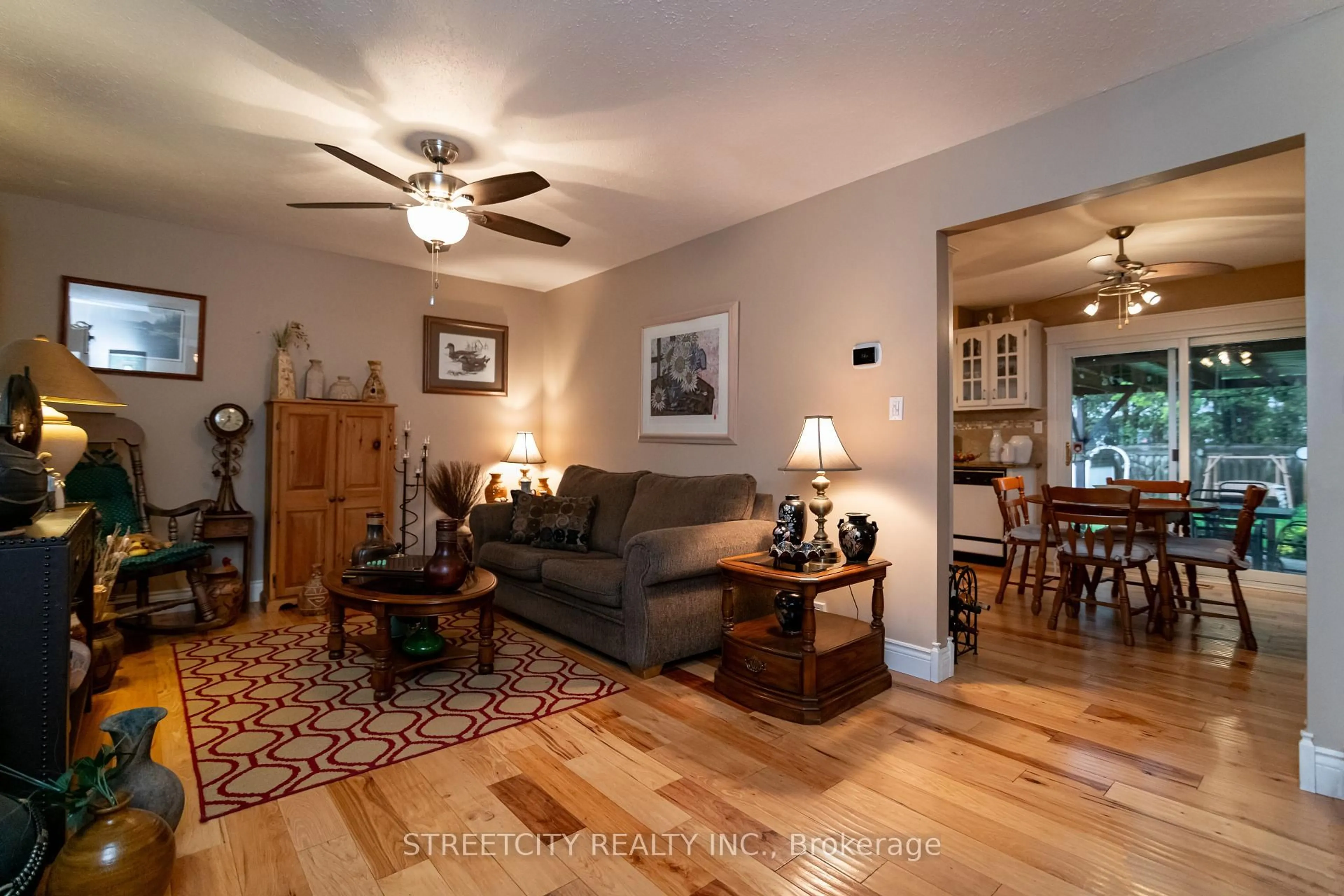 Living room with furniture, wood/laminate floor for 10 Hidden Valley Dr, Chatham-Kent Ontario N0P 1A0