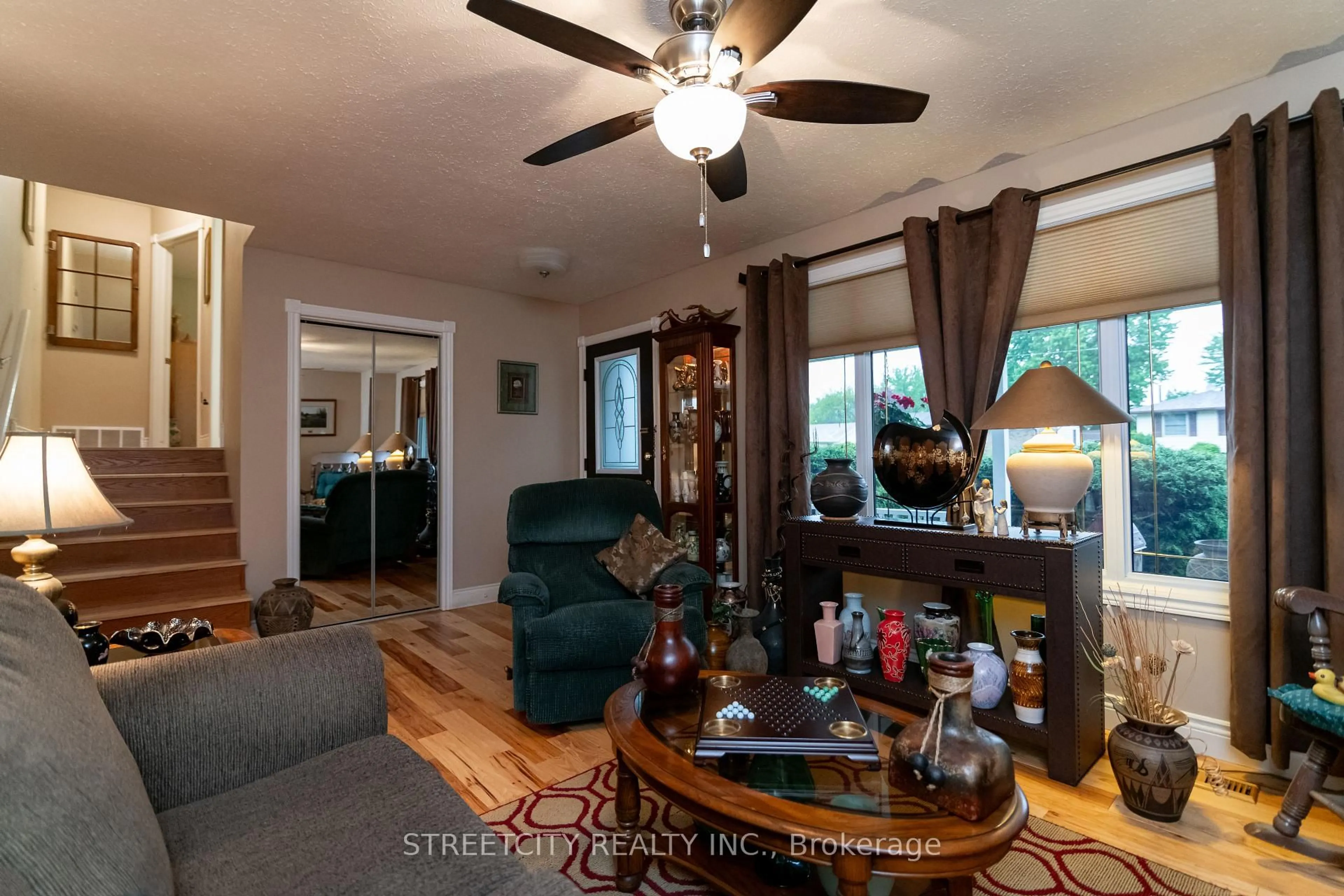Living room with furniture, wood/laminate floor for 10 Hidden Valley Dr, Chatham-Kent Ontario N0P 1A0