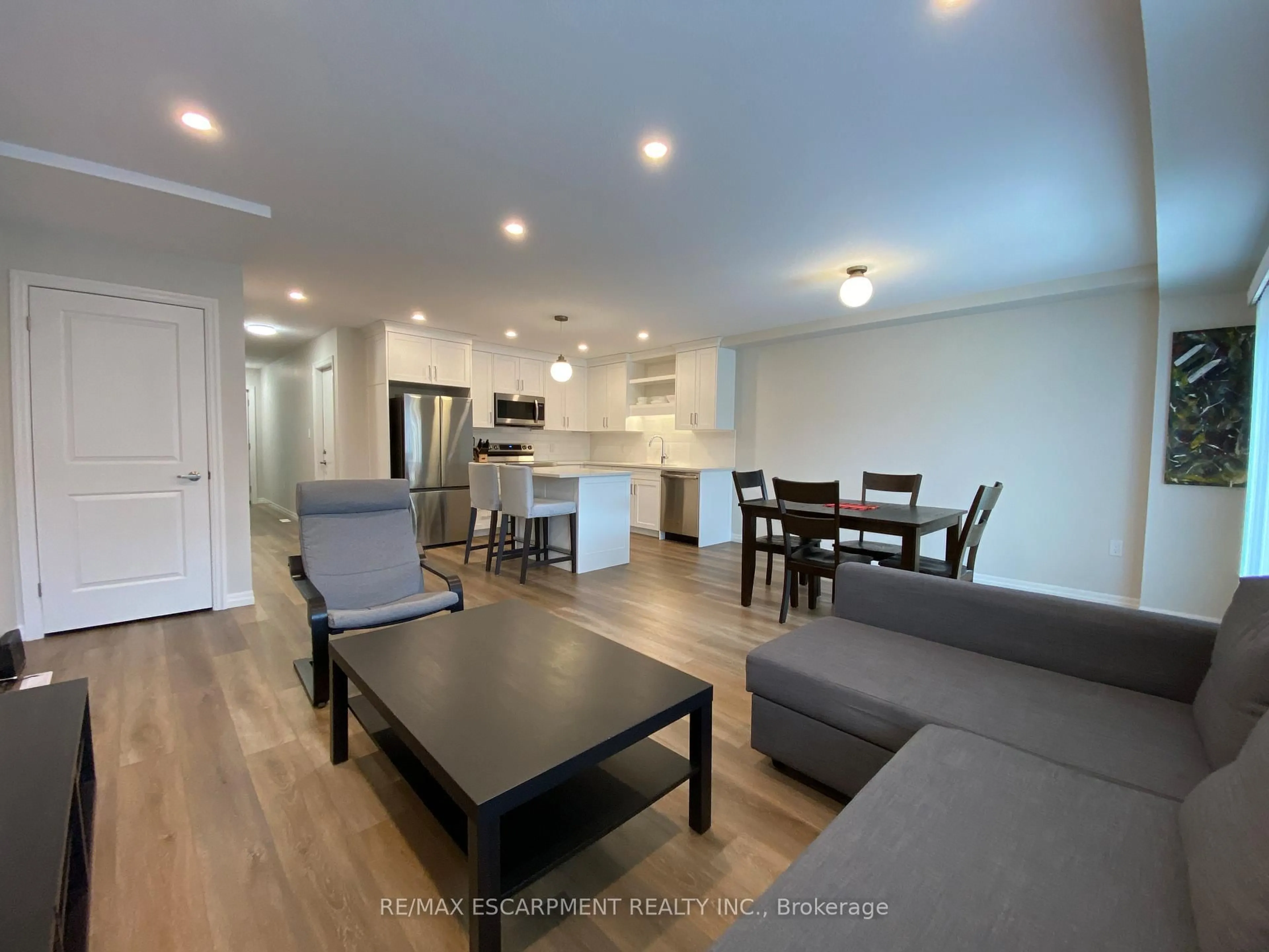 Open concept kitchen, wood/laminate floor for 3 Trailside Dr, St. Marys Ontario N4X 0A8