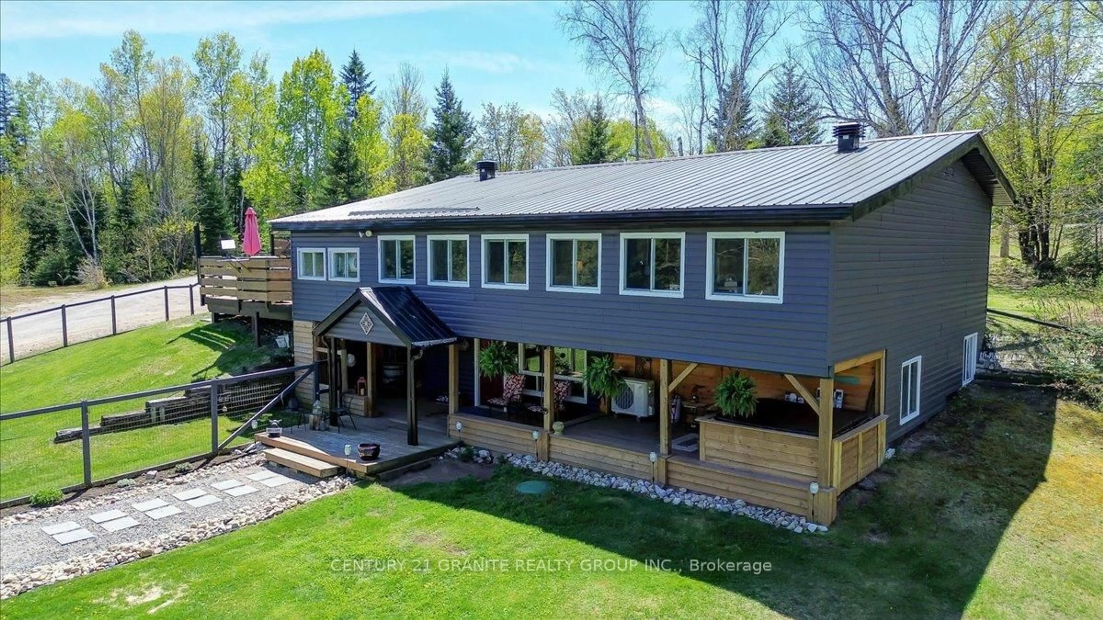 A pic from outside/outdoor area/front of a property/back of a property/a pic from drone, unknown for 1522 Highway 127 N/A, Maynooth Ontario K0L 2K0