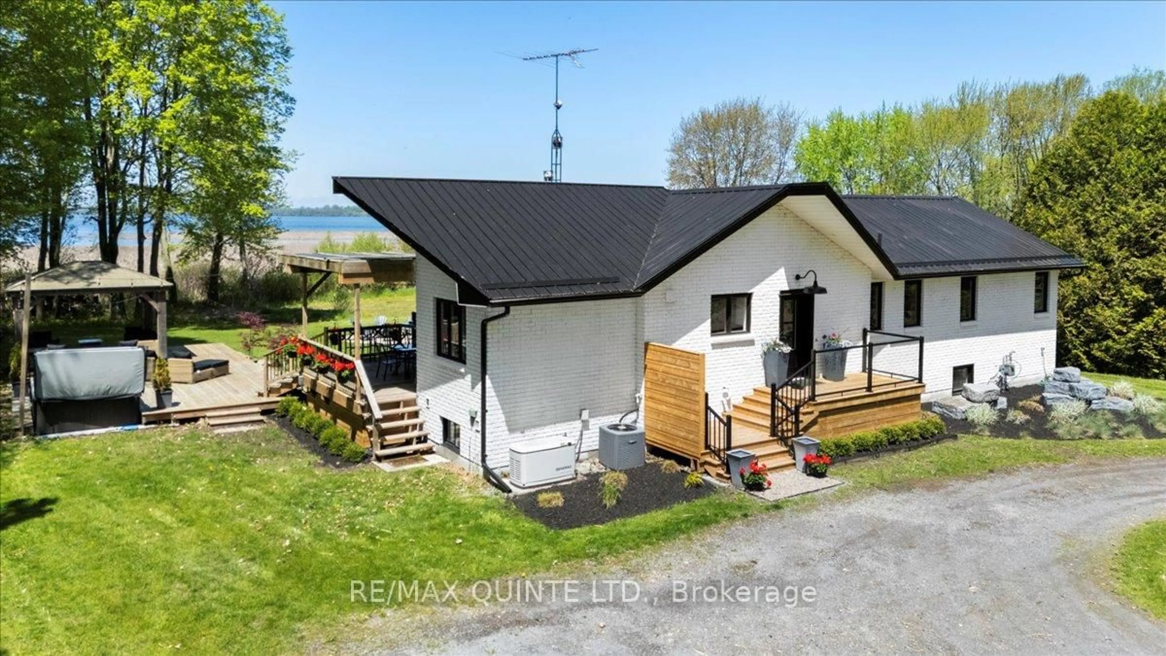 A pic from outside/outdoor area/front of a property/back of a property/a pic from drone, unknown for 1406 County Road 12 N/A, Prince Edward County Ontario K0K 2T0