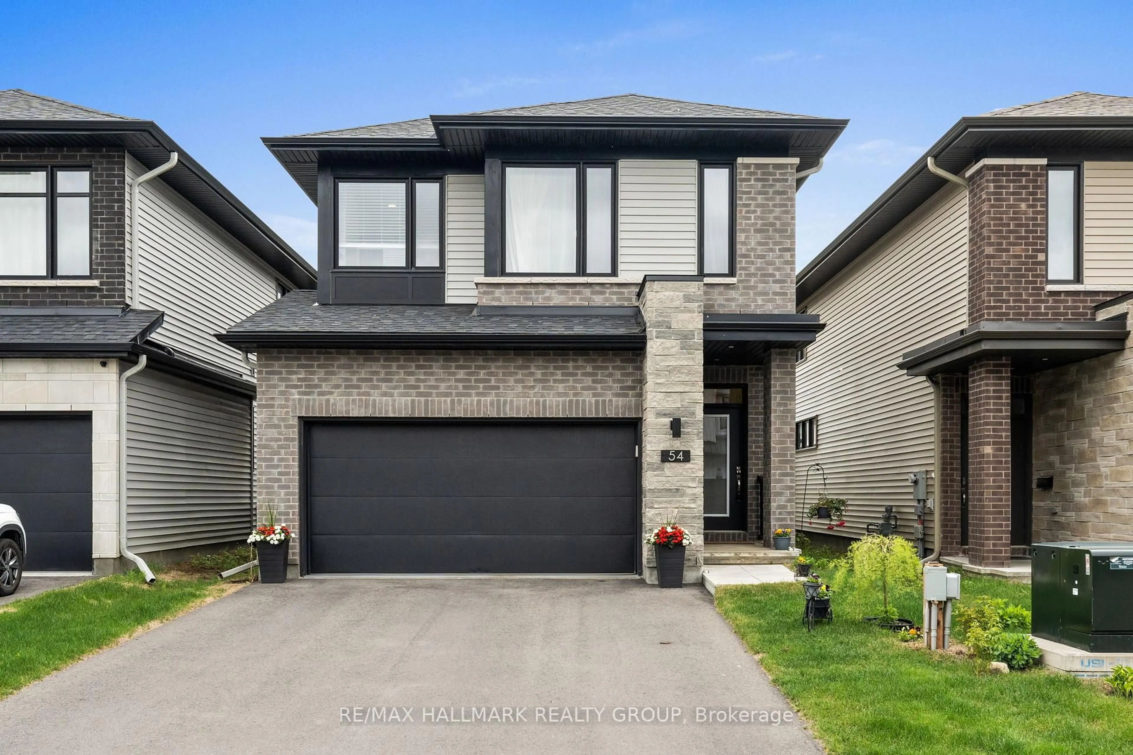 Home with brick exterior material, street for 54 Whooping Crane Rdge, Ottawa Ontario K4M 0P2