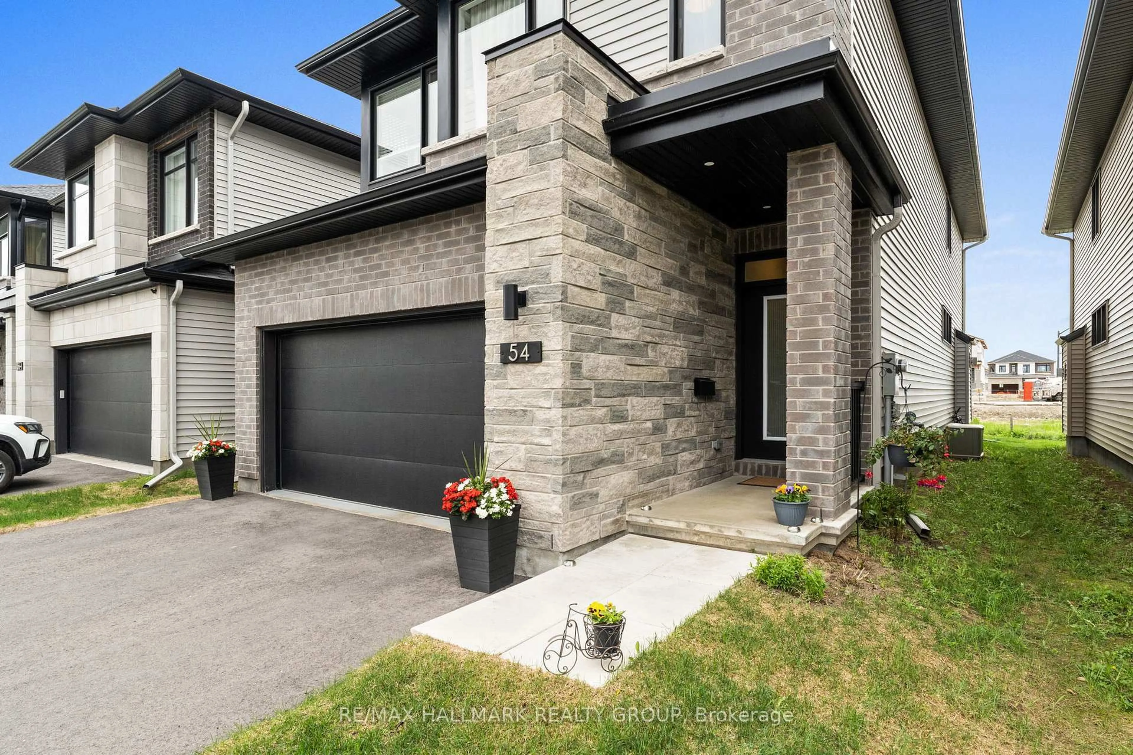 Home with brick exterior material, street for 54 Whooping Crane Rdge, Ottawa Ontario K4M 0P2