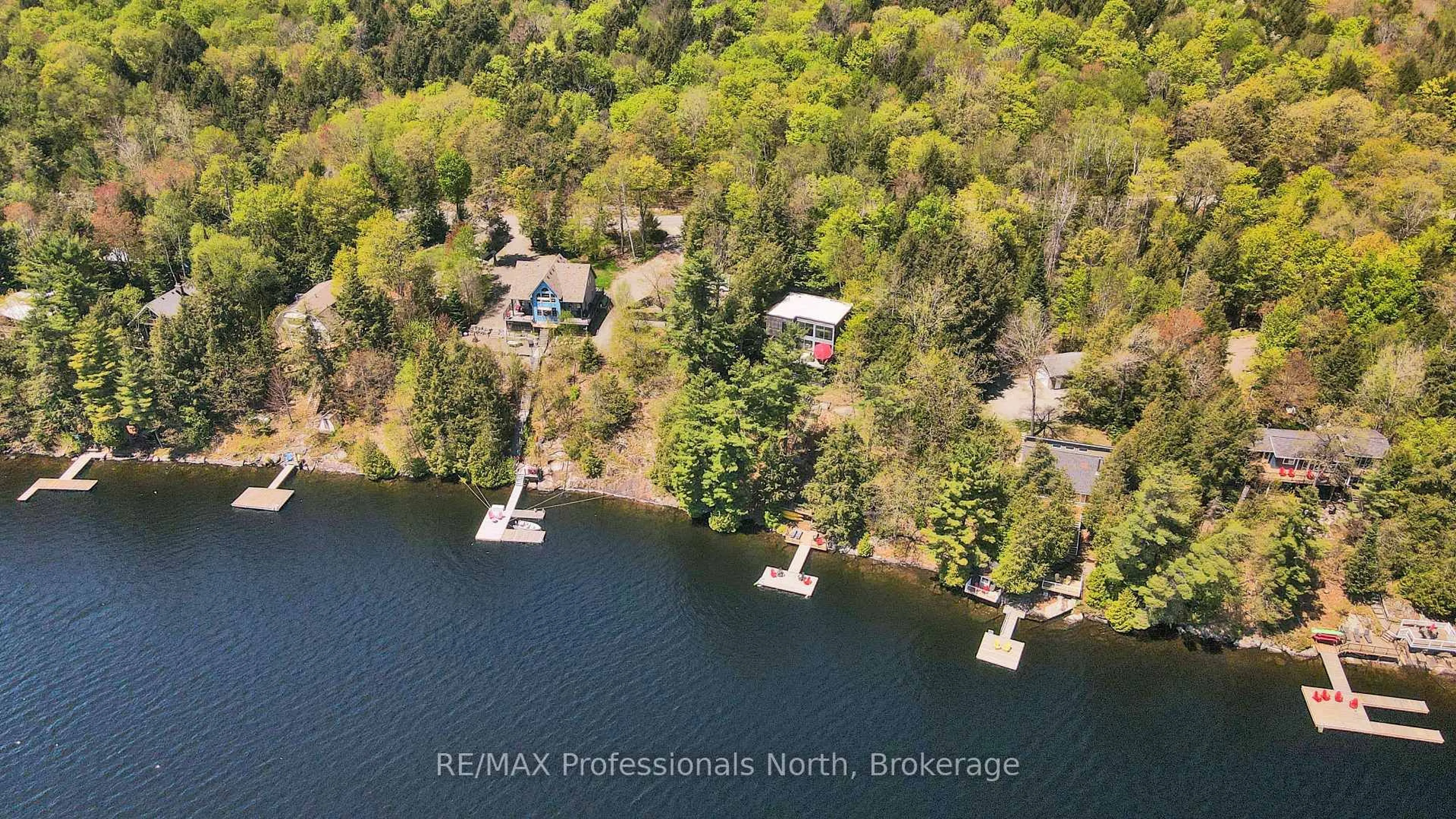 A pic from outside/outdoor area/front of a property/back of a property/a pic from drone, water/lake/river/ocean view for 1004 Lipton Dr, Dysart et al Ontario K0M 1S0