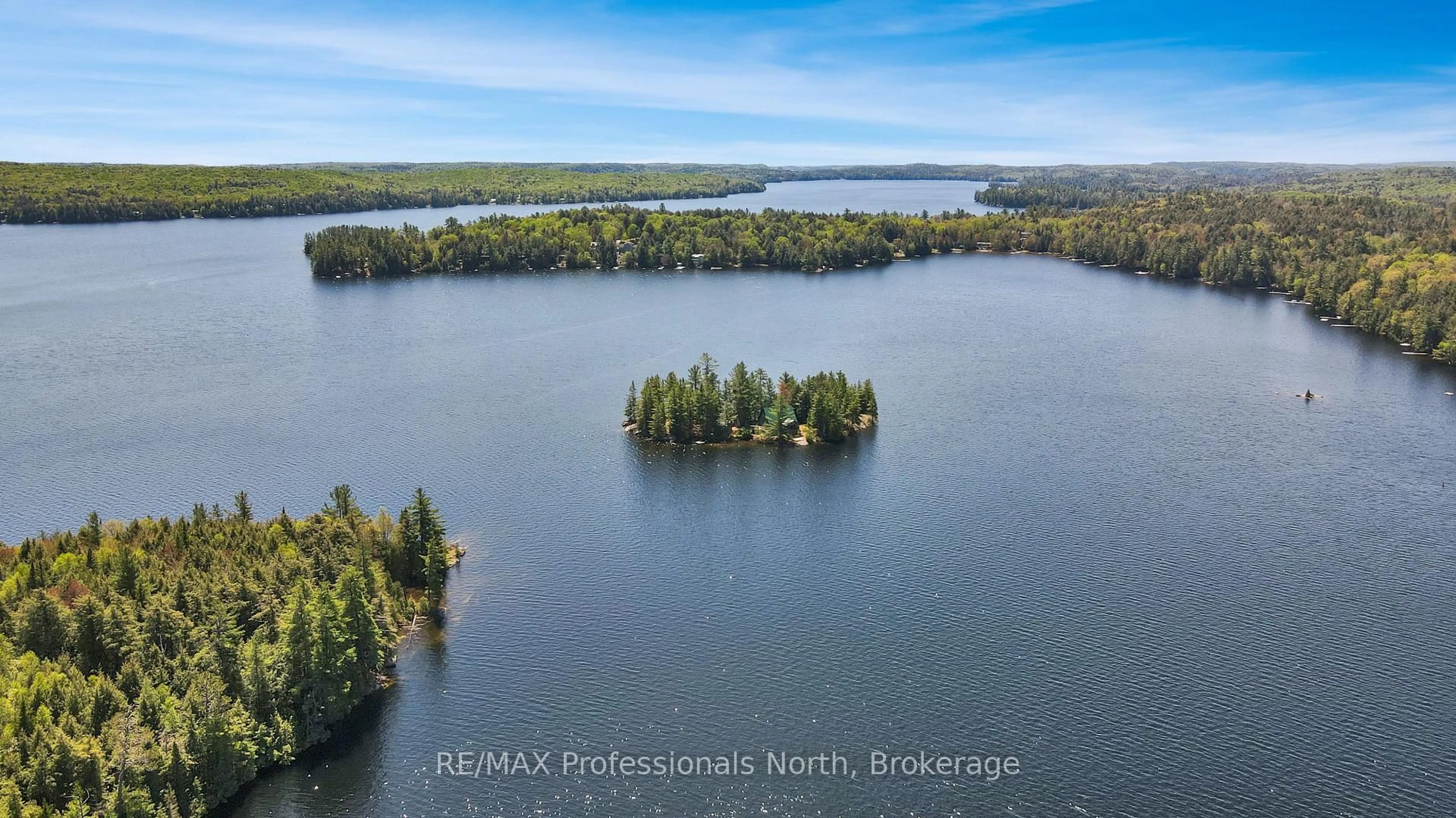 A pic from outside/outdoor area/front of a property/back of a property/a pic from drone, water/lake/river/ocean view for 1004 Lipton Dr, Dysart et al Ontario K0M 1S0