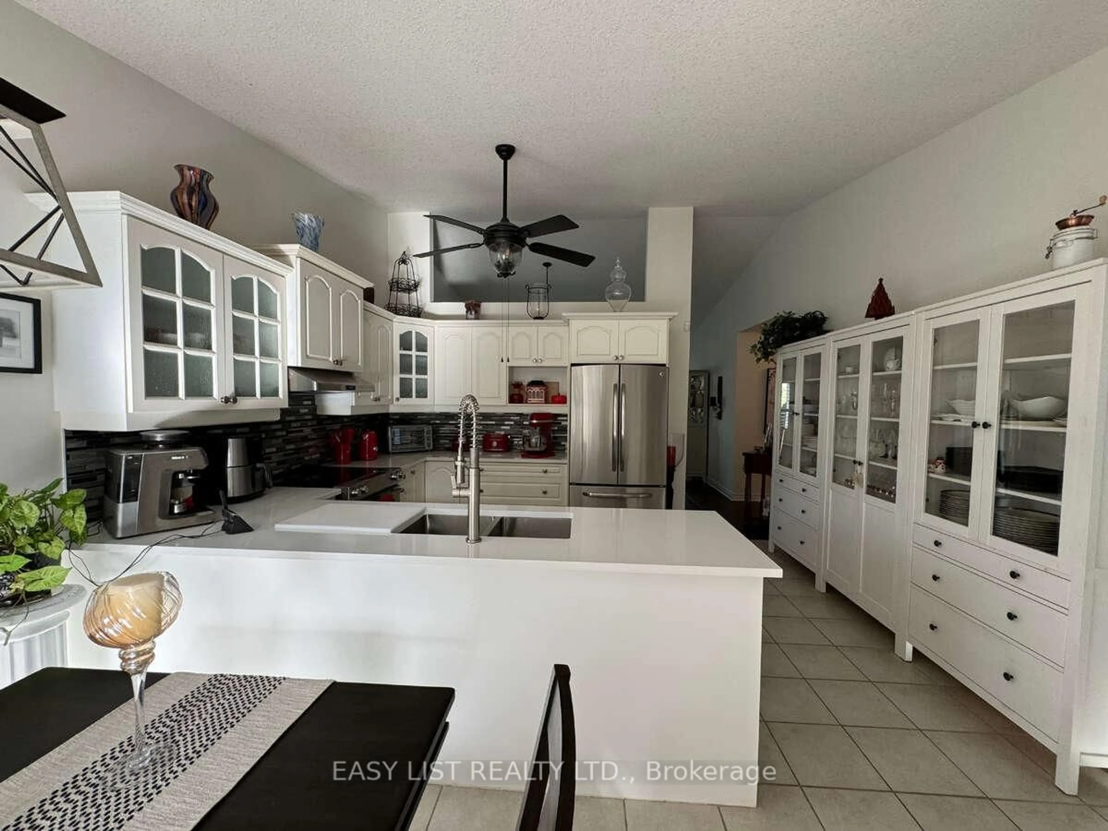 Open concept kitchen, ceramic/tile floor for 869 Whetherfield St #50, London North Ontario N6H 0A2