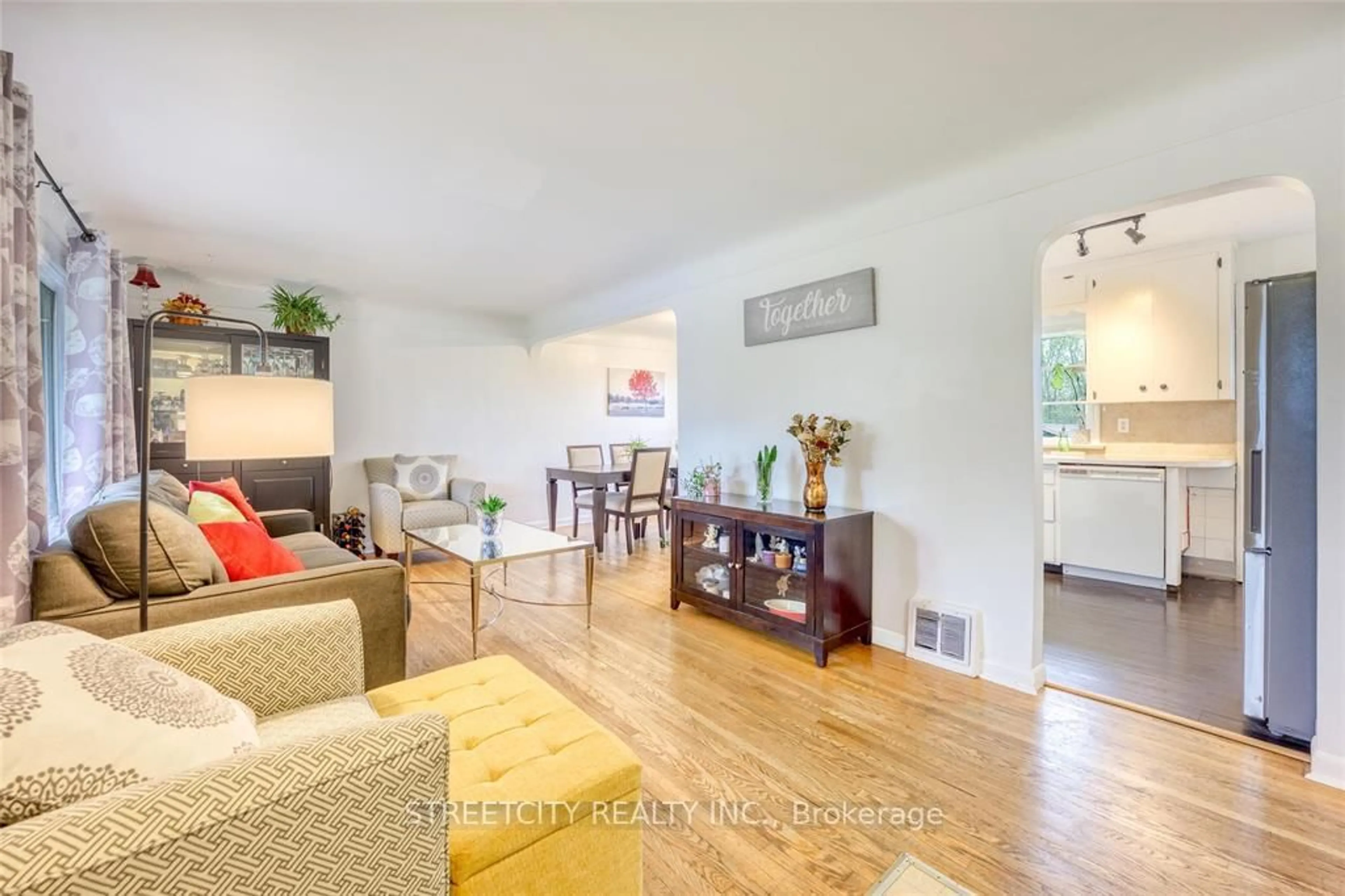 Living room with furniture, wood/laminate floor for 8113 Lisgar St, Brooke-Alvinston Ontario N0N 1A0