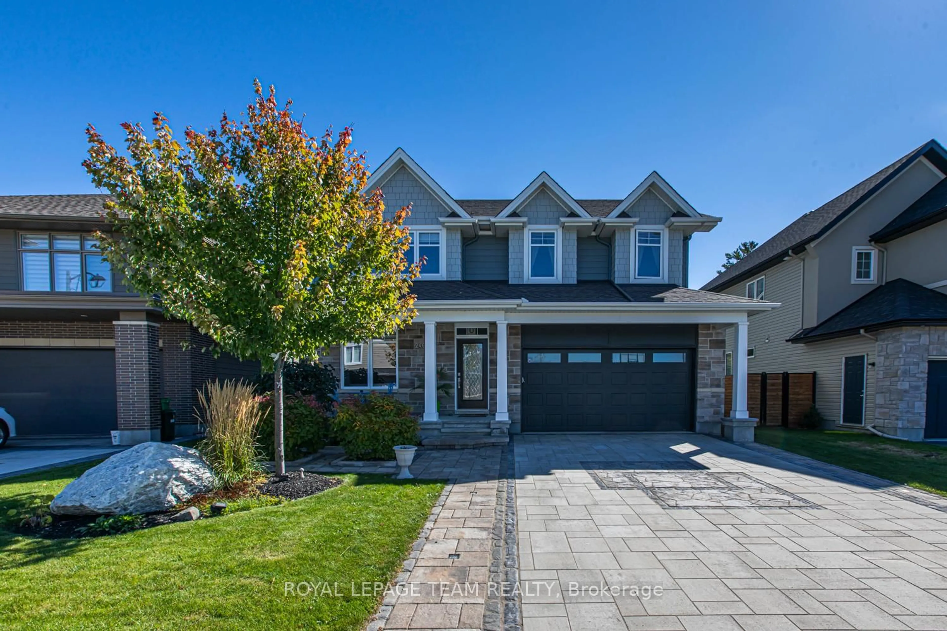 Home with brick exterior material, street for 240 ESCARPMENT Cres, Ottawa Ontario K2T 0L6