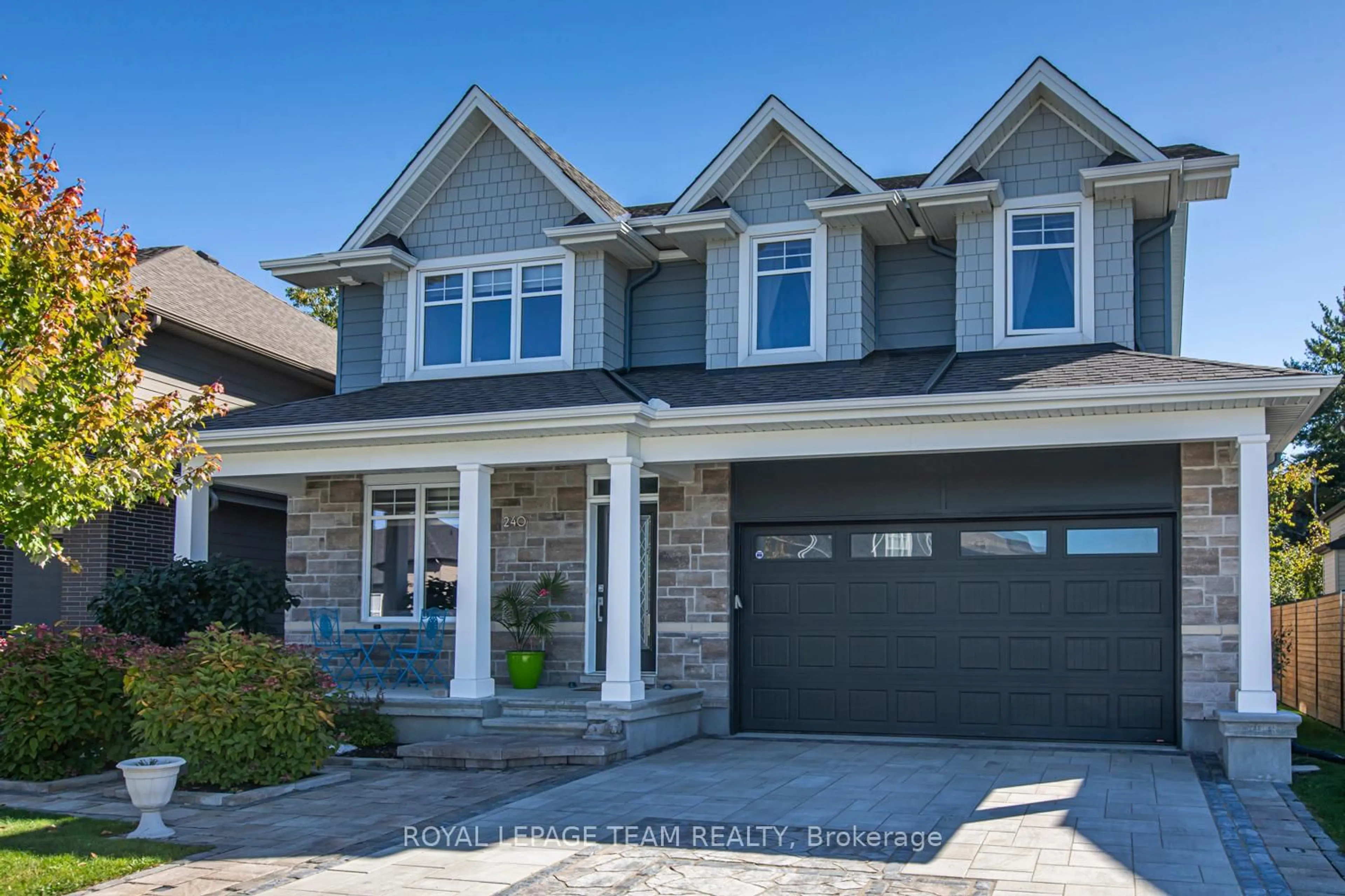 Home with brick exterior material, street for 240 ESCARPMENT Cres, Ottawa Ontario K2T 0L6