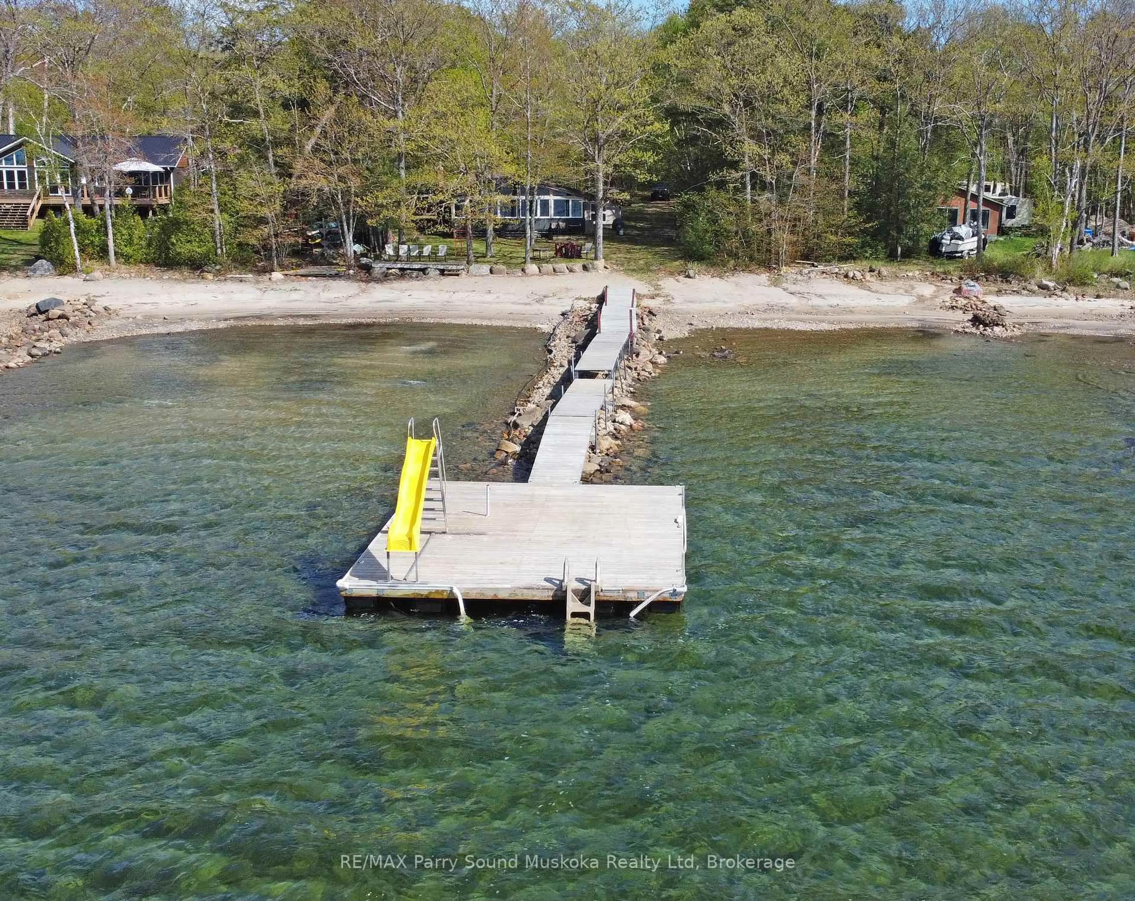 A pic from outside/outdoor area/front of a property/back of a property/a pic from drone, water/lake/river/ocean view for 400 (Lot 1) Oak Point Rd, Parry Sound Ontario P2A 2X4