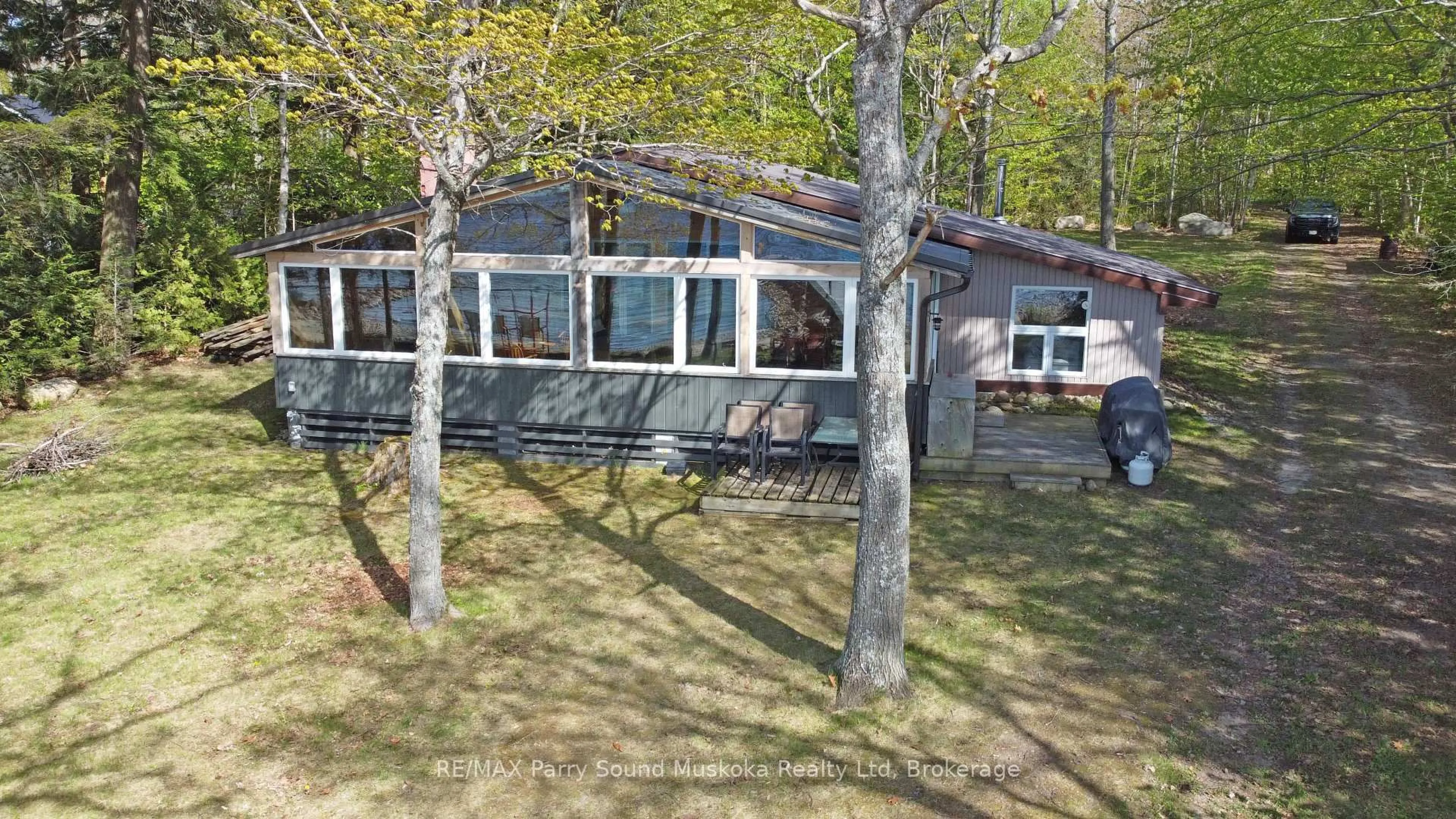 A pic from outside/outdoor area/front of a property/back of a property/a pic from drone, water/lake/river/ocean view for 400 (Lot 1) Oak Point Rd, Parry Sound Ontario P2A 2X4