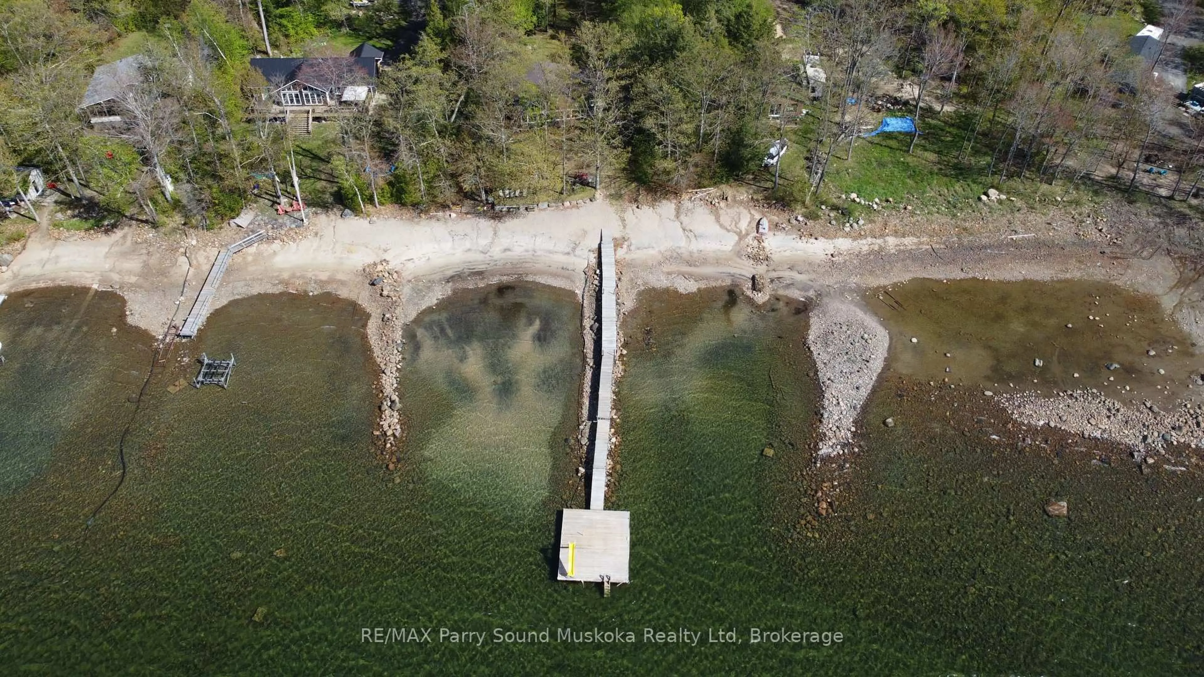 A pic from outside/outdoor area/front of a property/back of a property/a pic from drone, water/lake/river/ocean view for 400 (Lot 1) Oak Point Rd, Parry Sound Ontario P2A 2X4