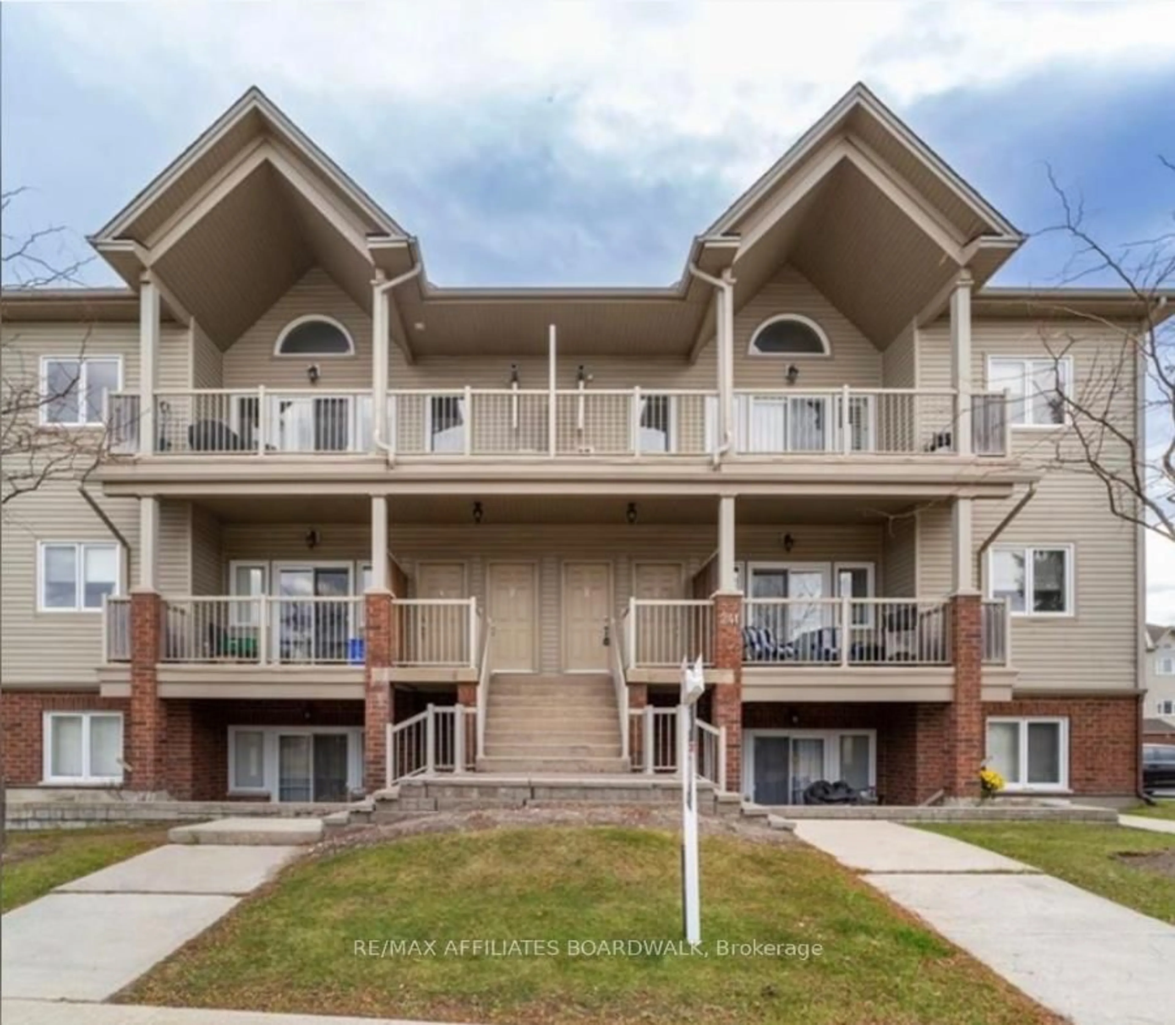 A pic from outside/outdoor area/front of a property/back of a property/a pic from drone, unknown for 241 Crestway Crescent Dr #I, Ottawa Ontario K2G 0A9