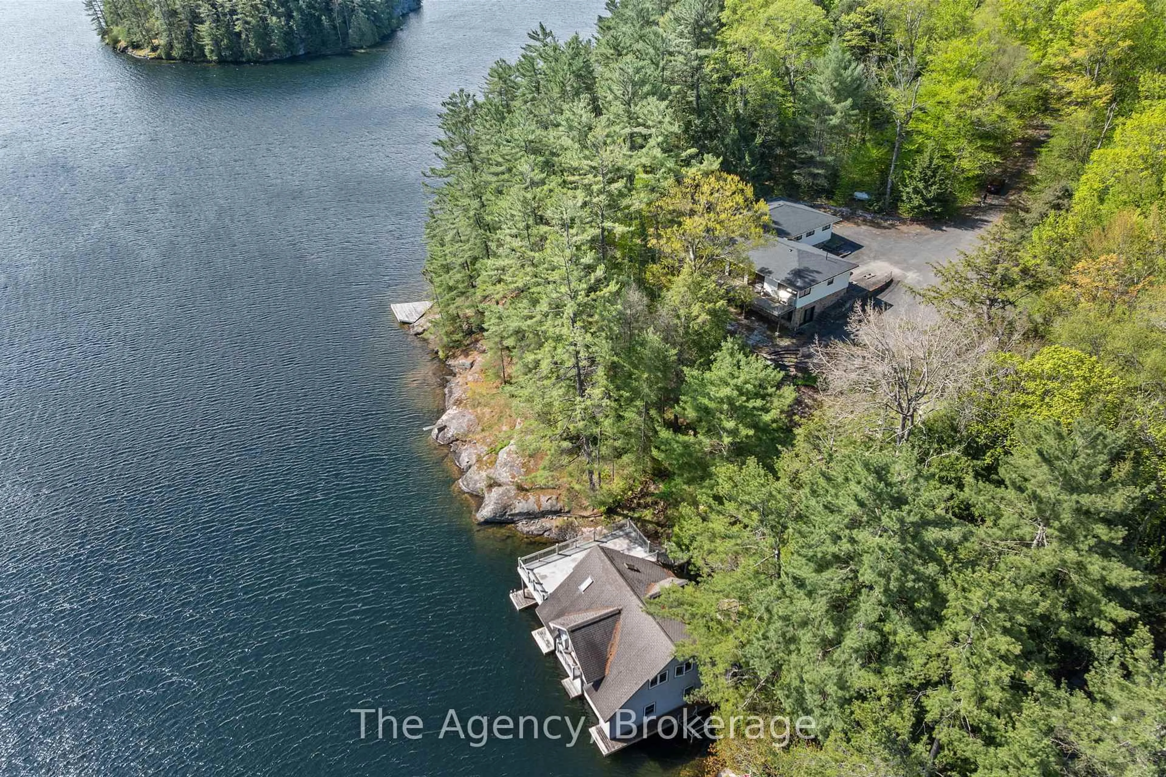A pic from outside/outdoor area/front of a property/back of a property/a pic from drone, water/lake/river/ocean view for 80 Tall Timbers Rd, Seguin Ontario P2A 2W8