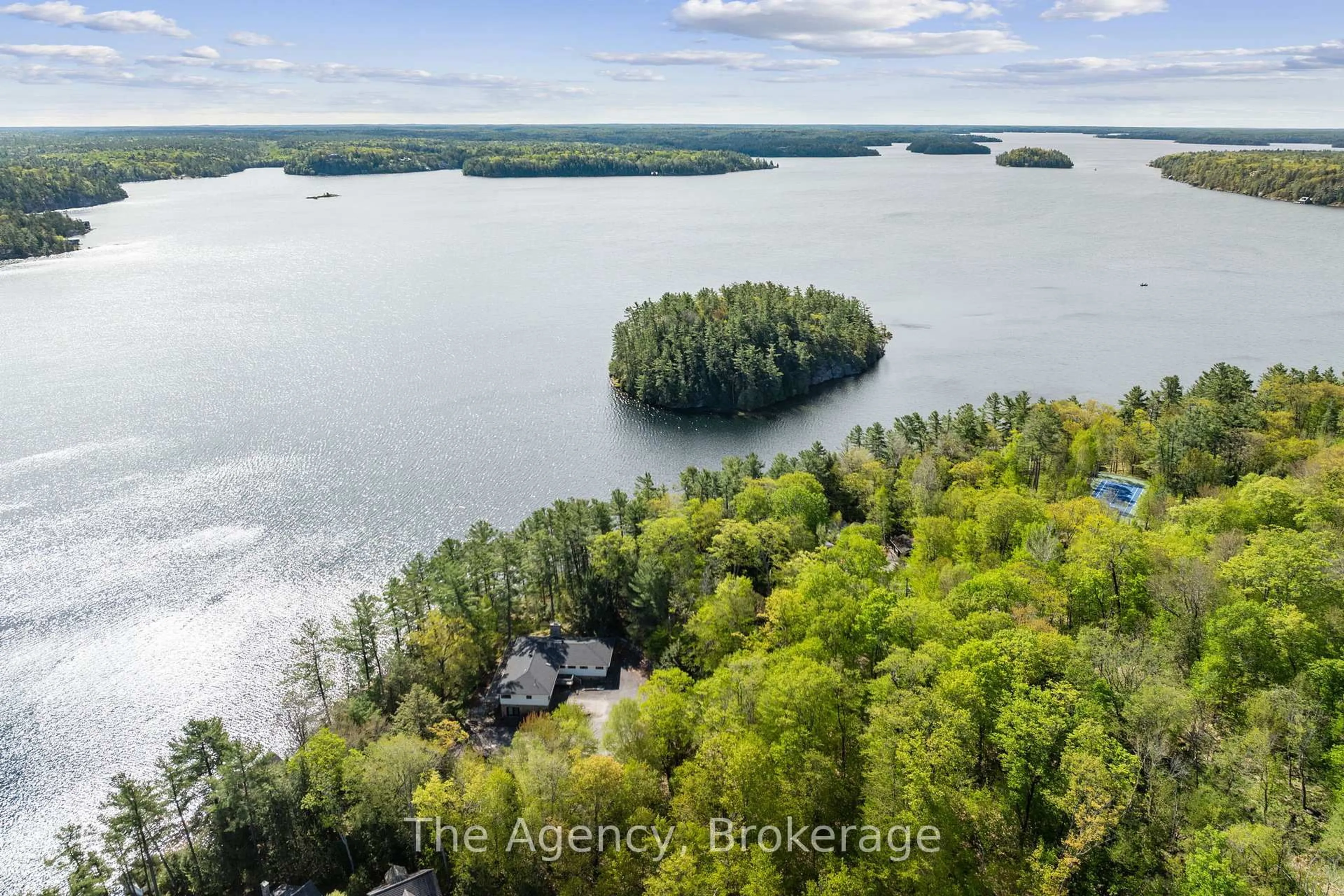 A pic from outside/outdoor area/front of a property/back of a property/a pic from drone, water/lake/river/ocean view for 80 Tall Timbers Rd, Seguin Ontario P2A 2W8