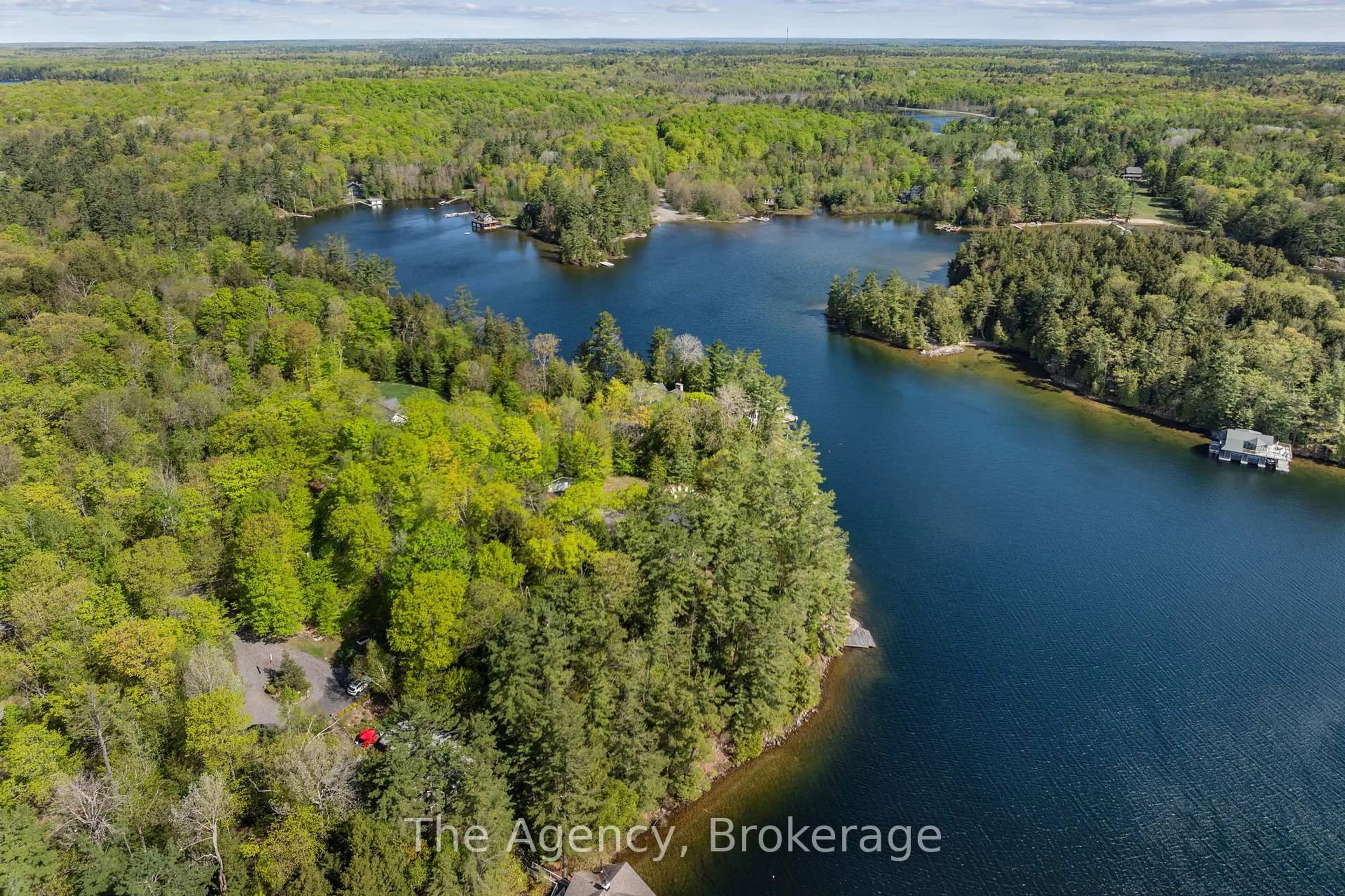 A pic from outside/outdoor area/front of a property/back of a property/a pic from drone, water/lake/river/ocean view for 80 Tall Timbers Rd, Seguin Ontario P2A 2W8