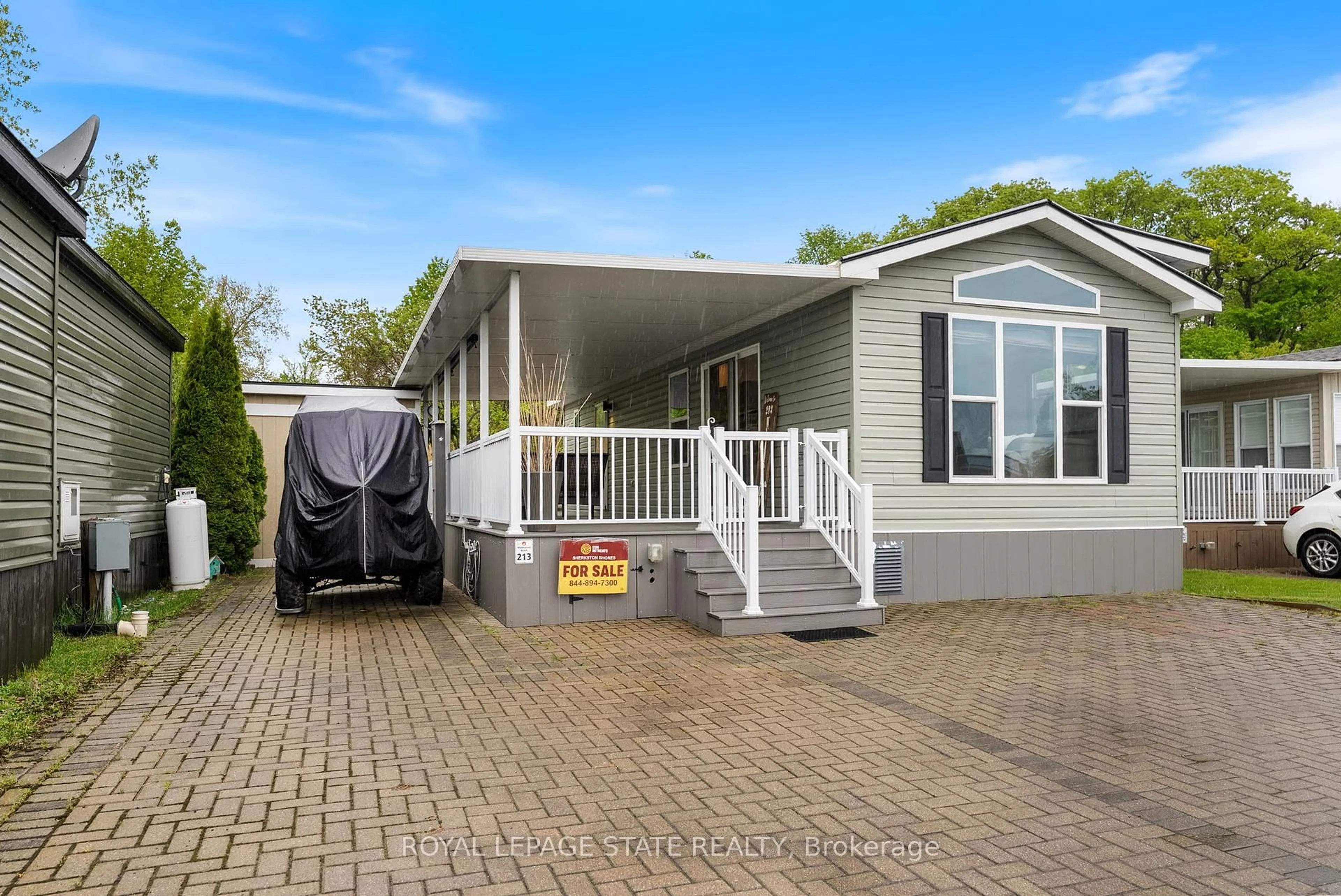 Home with vinyl exterior material, street for 490 Empire Rd #213, Port Colborne Ontario L0S 1R0