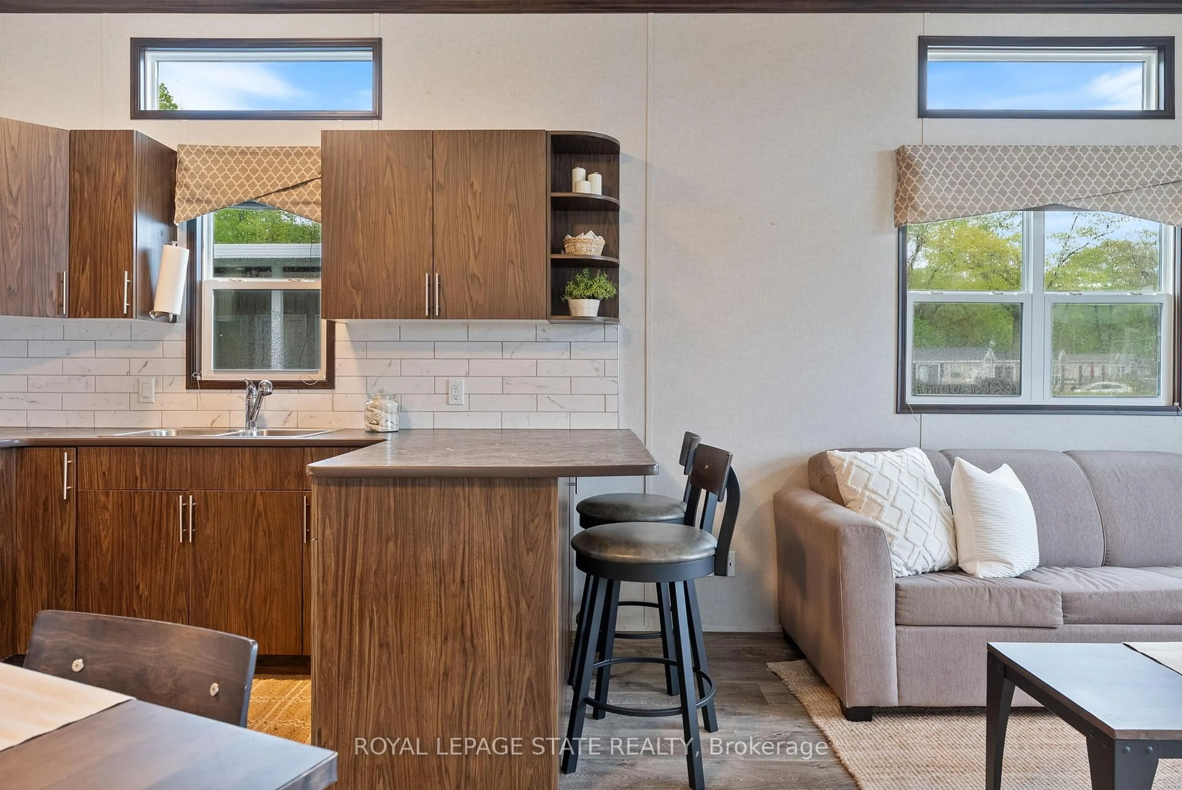 Open concept kitchen, ceramic/tile floor for 490 Empire Rd #213, Port Colborne Ontario L0S 1R0