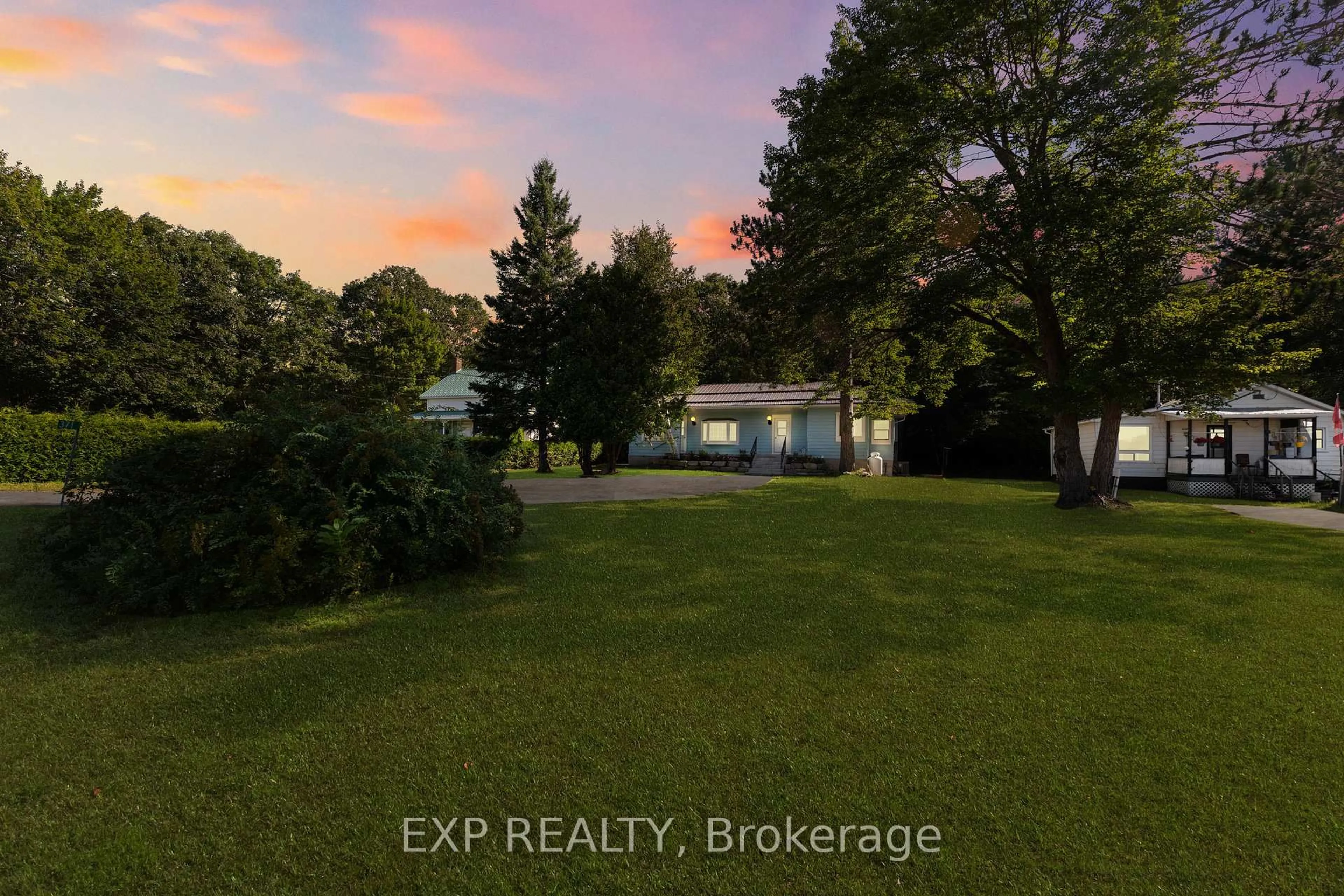 A pic from outside/outdoor area/front of a property/back of a property/a pic from drone, water/lake/river/ocean view for 371 John St, Barry's Bay Ontario K0J 1B0