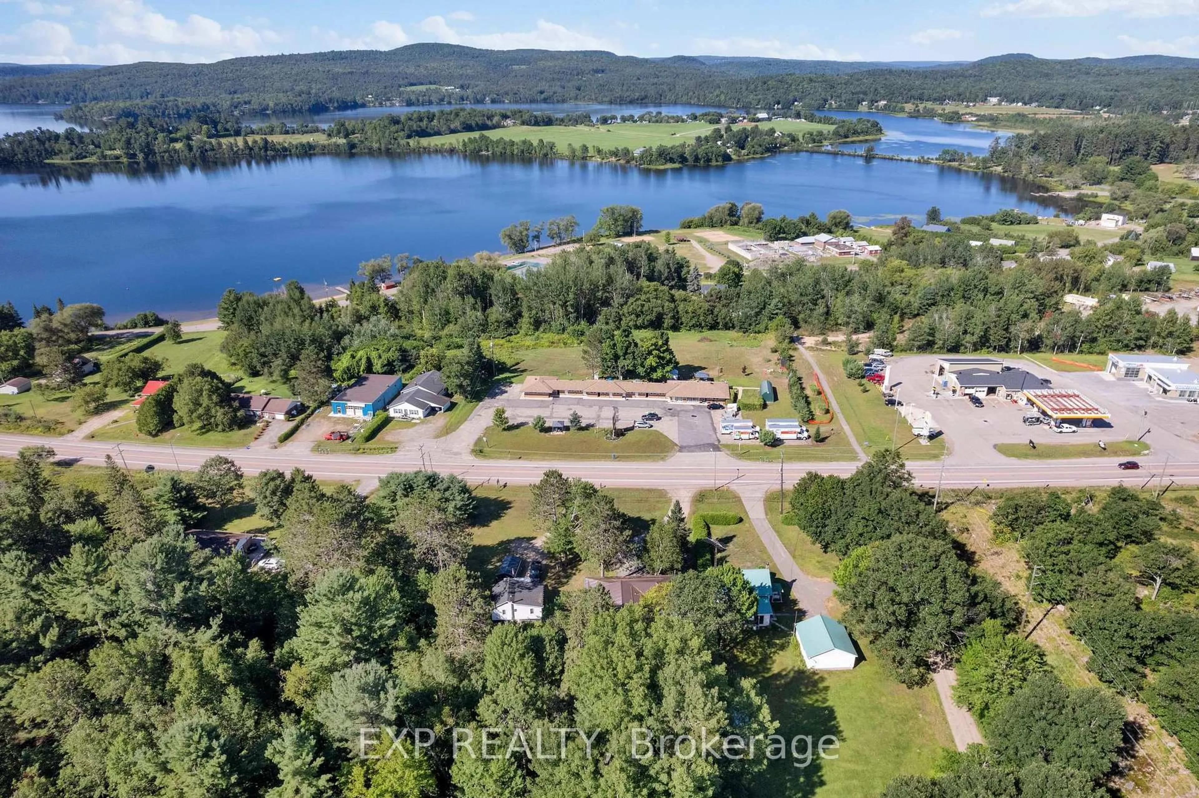 A pic from outside/outdoor area/front of a property/back of a property/a pic from drone, water/lake/river/ocean view for 371 John St, Barry's Bay Ontario K0J 1B0