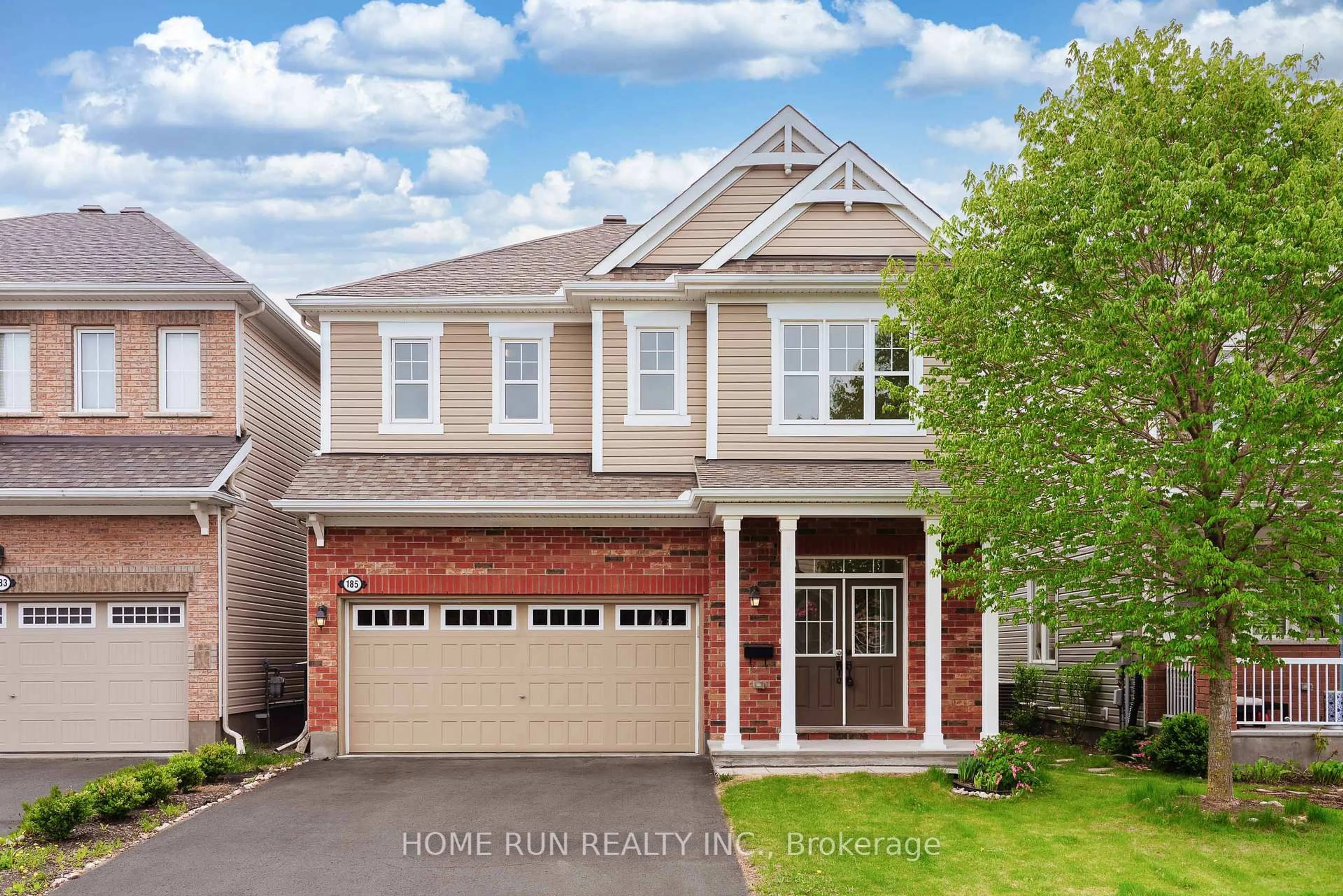 Home with brick exterior material, street for 185 Flowing Creek Circ, Ottawa Ontario K2M 0K2