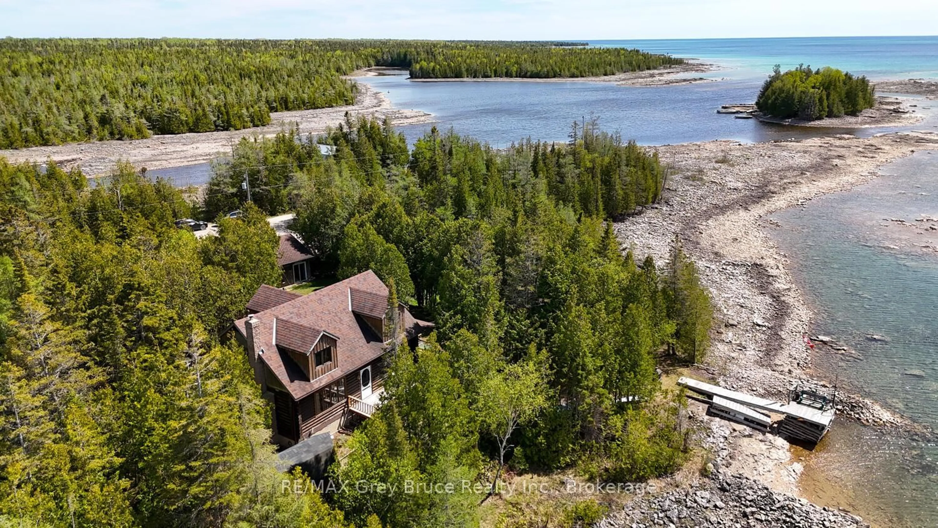 A pic from outside/outdoor area/front of a property/back of a property/a pic from drone, water/lake/river/ocean view for 296 Bradley Dr, Northern Bruce Peninsula Ontario N0H 1Z0