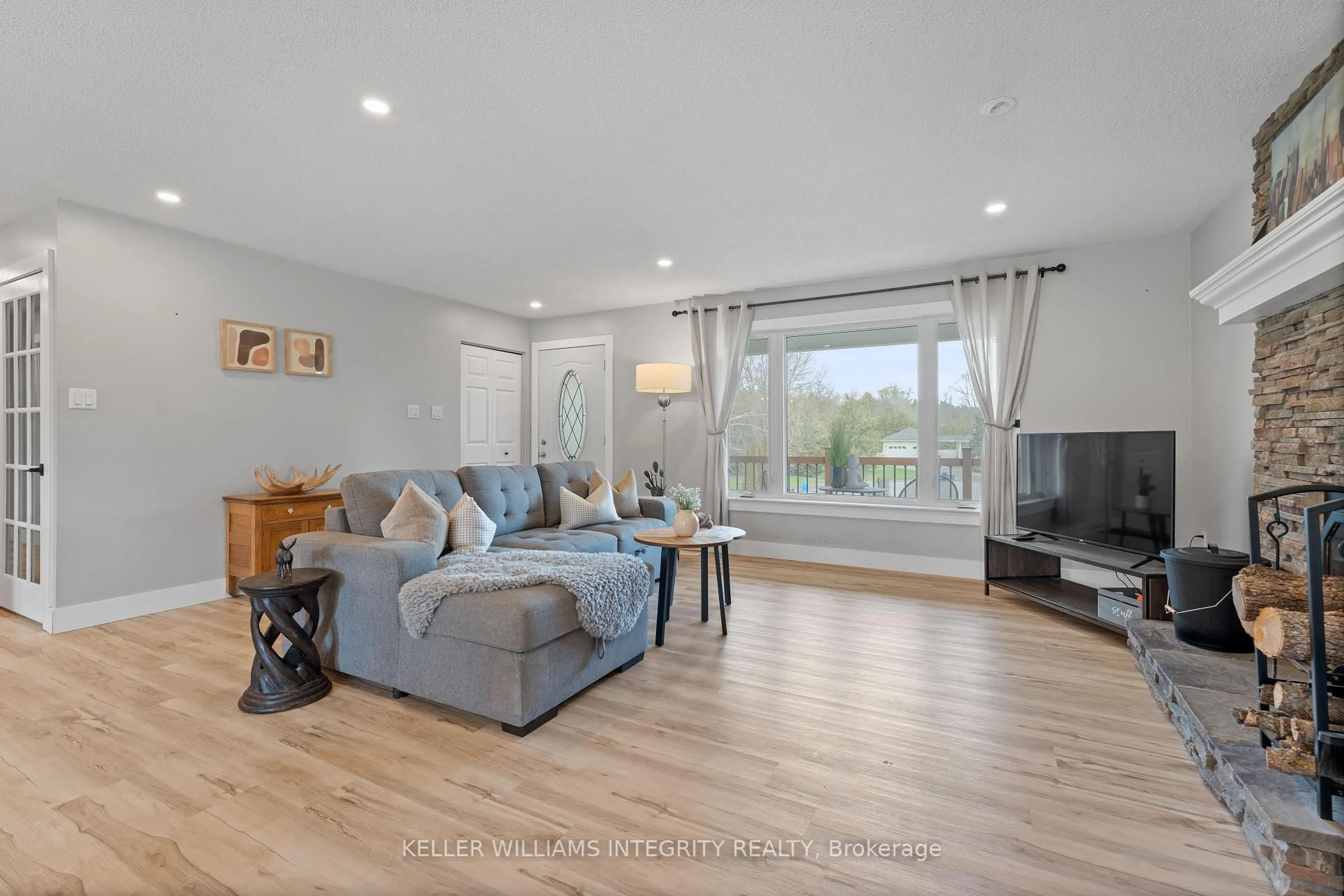 Living room with furniture, wood/laminate floor for 6 Aimee Lane, North Grenville Ontario K0G 1S0