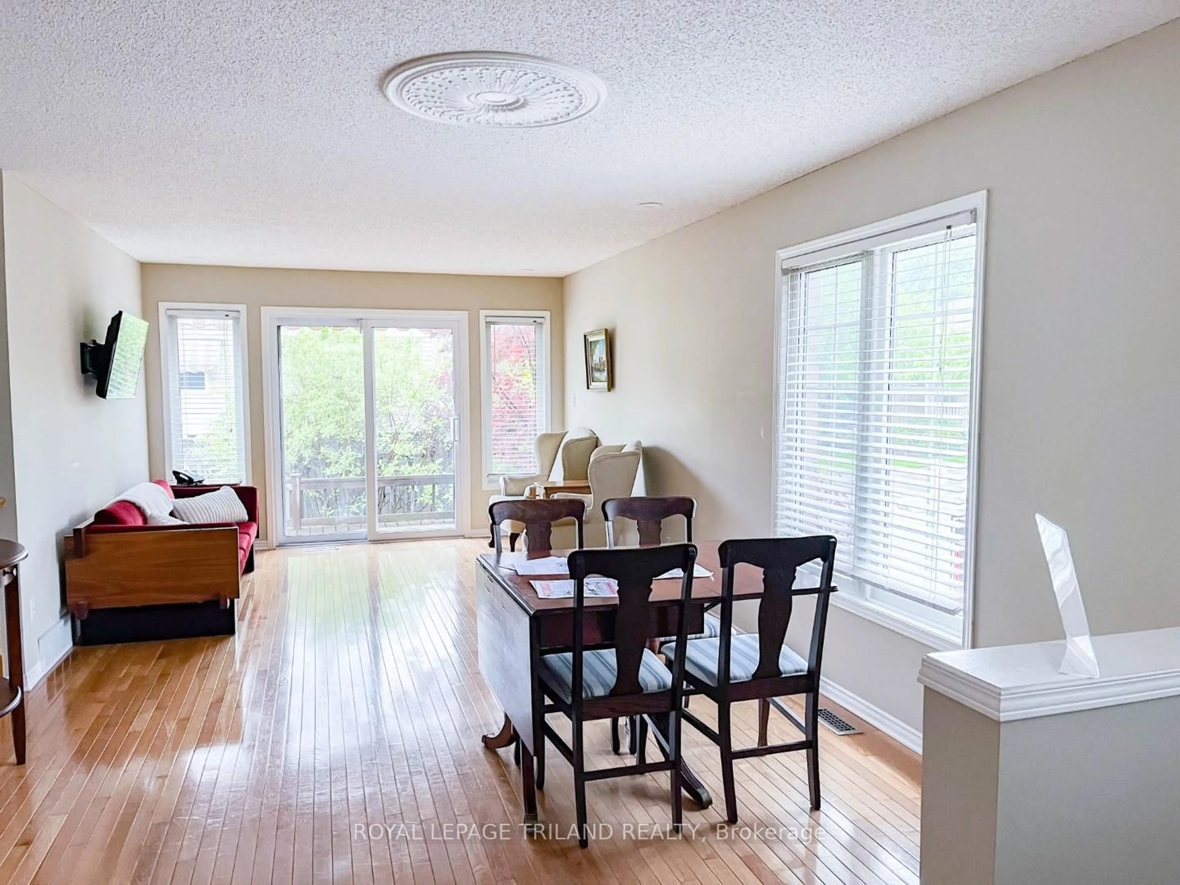 Living room with furniture, wood/laminate floor for 567 Fanshawe Park Rd #14, London North Ontario N5X 3T4