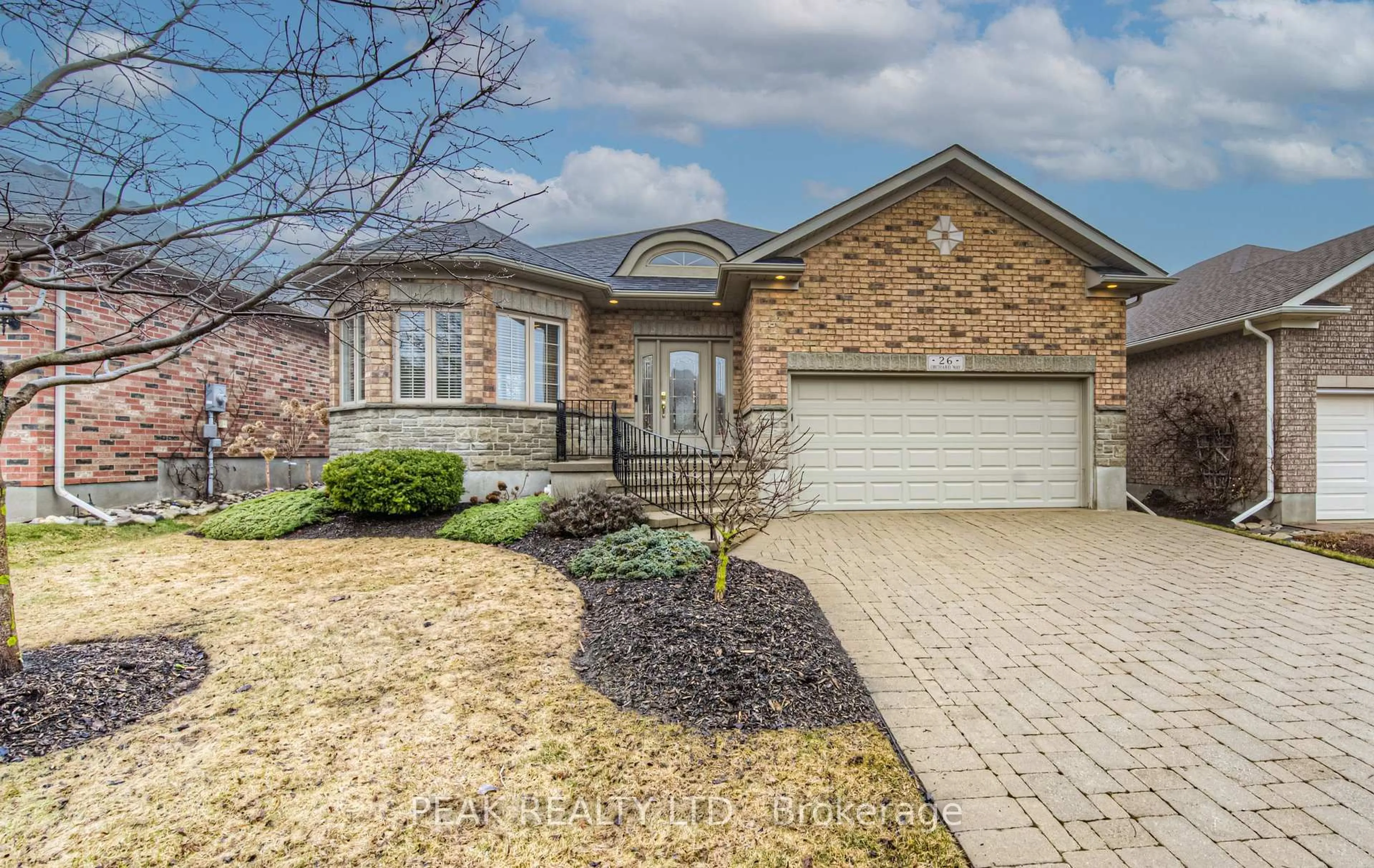 Home with brick exterior material, street for 26 Orchard Way, Wilmot Ontario N3A 4P7