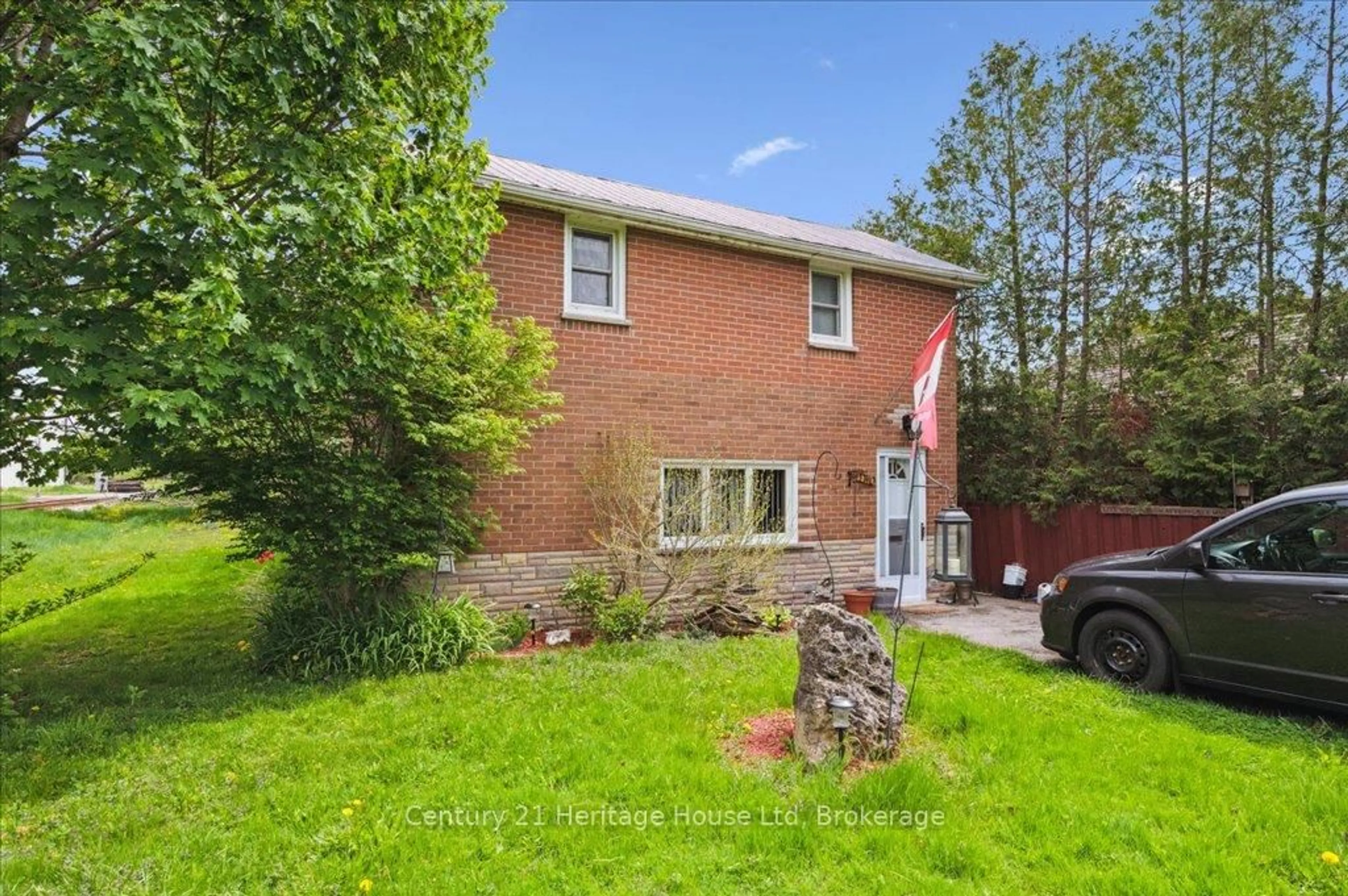 Home with brick exterior material, street for 2 Johnston St, Guelph Ontario N1E 5T3