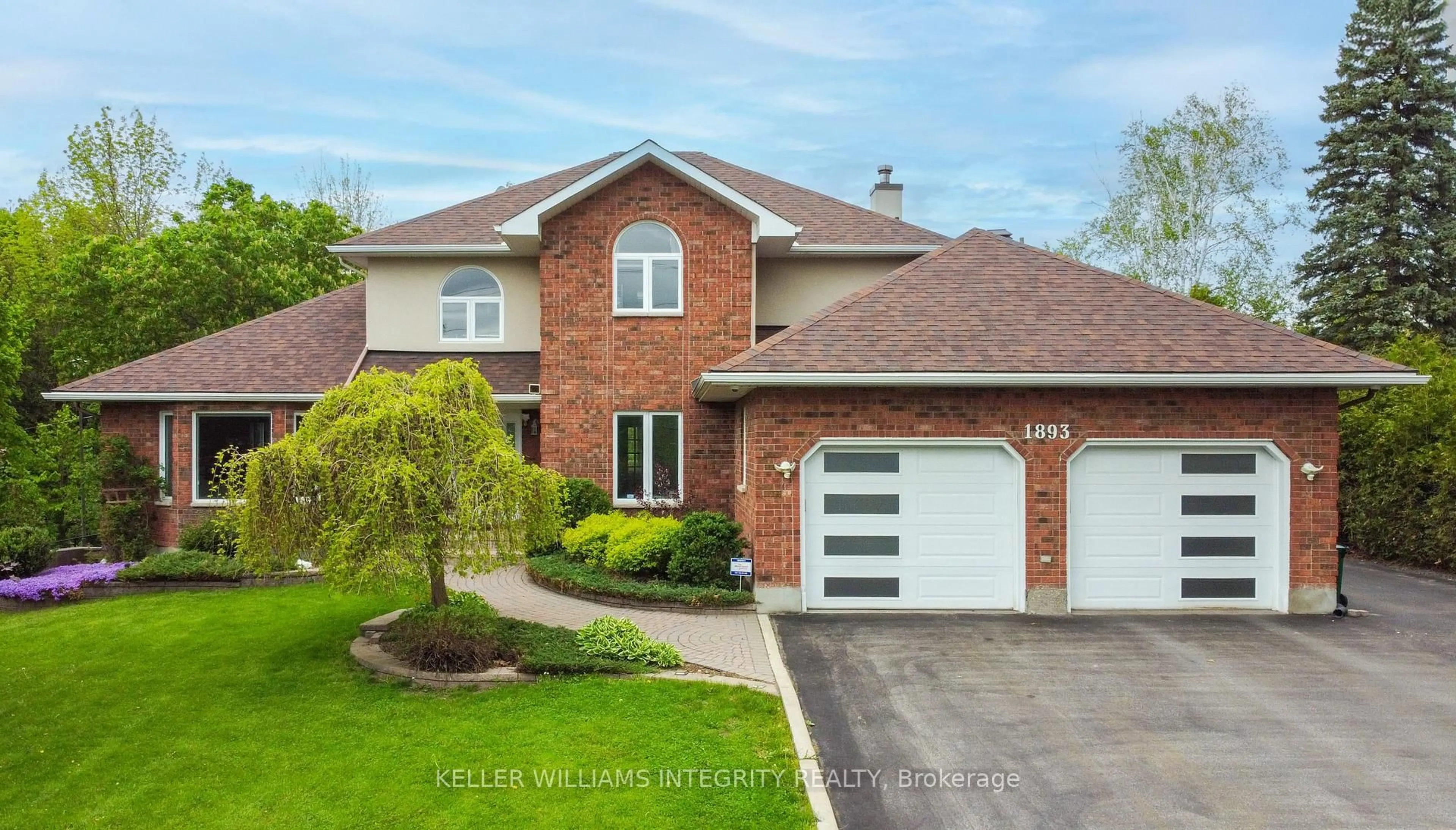 Home with brick exterior material, street for 1893 Rideau Rd, Ottawa Ontario K1X 1E1