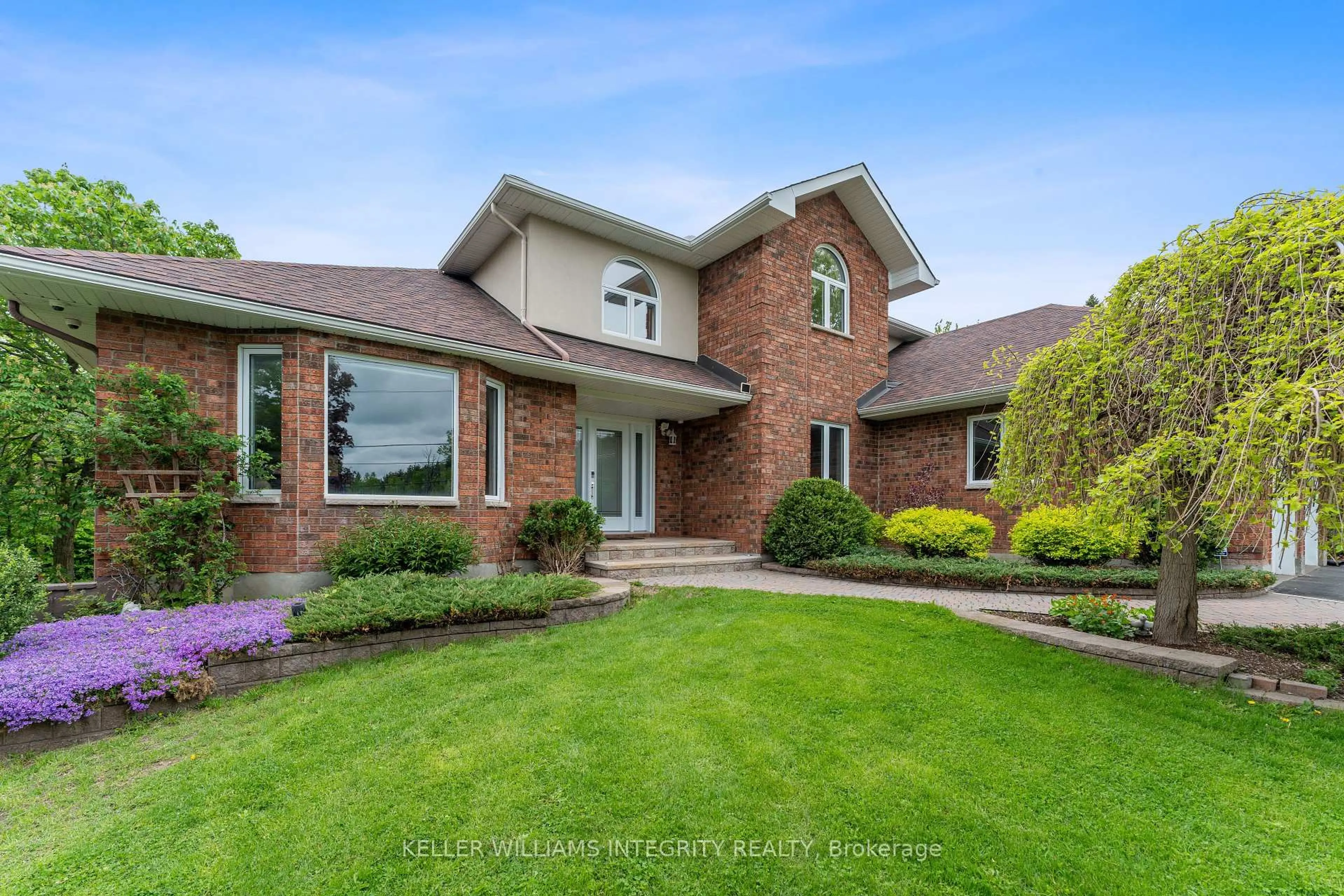 Home with brick exterior material, street for 1893 Rideau Rd, Ottawa Ontario K1X 1E1