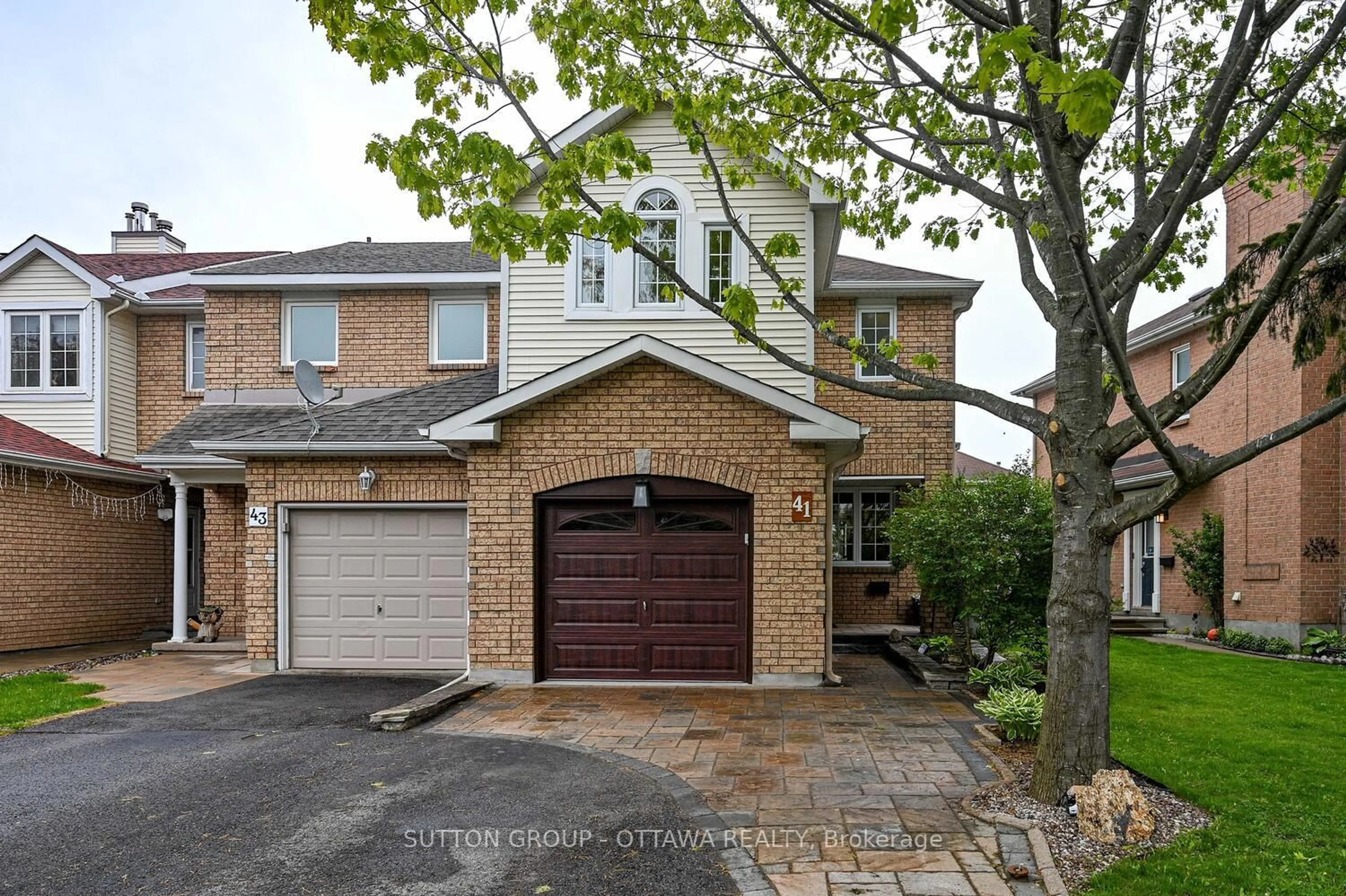Home with brick exterior material, street for 41 Mountshannon Dr, Ottawa Ontario K2J 4B8