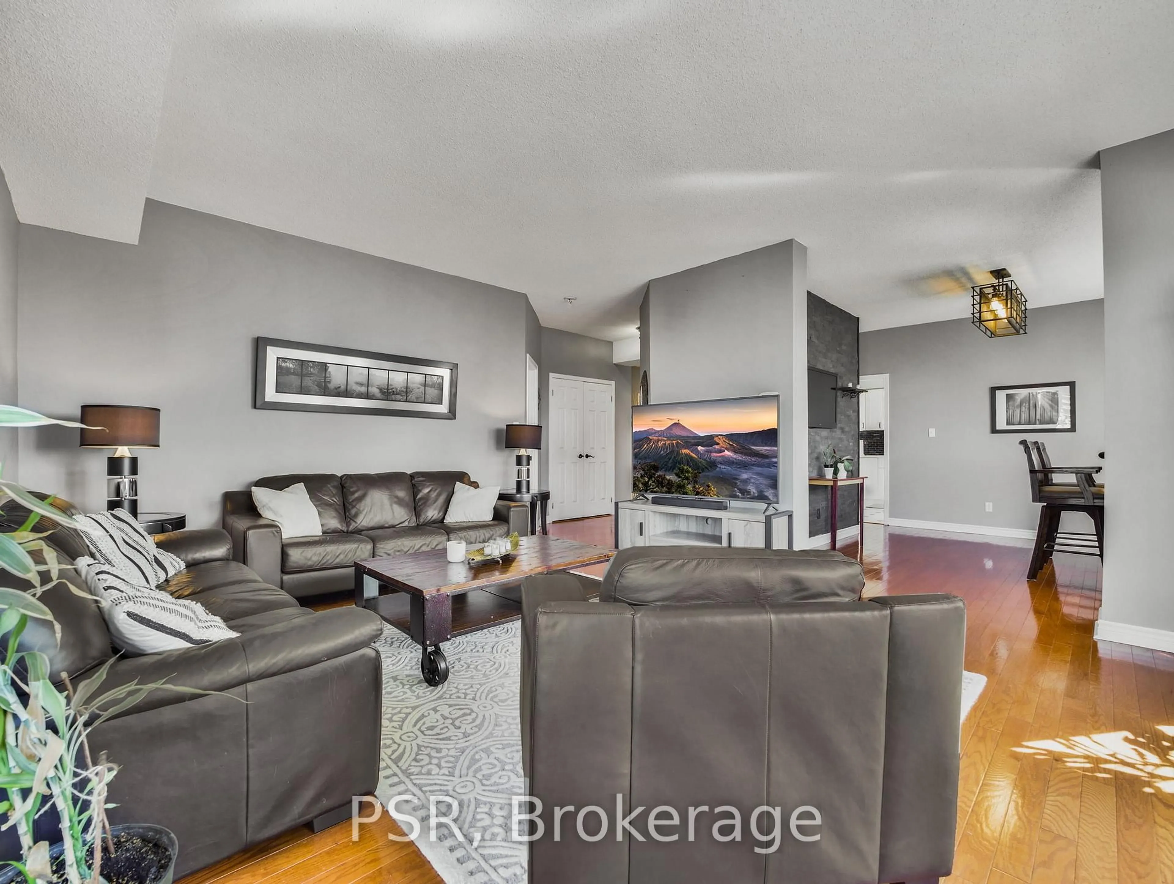 Living room with furniture, unknown for 67 Caroline St #17D, Hamilton Ontario L8P 3K6