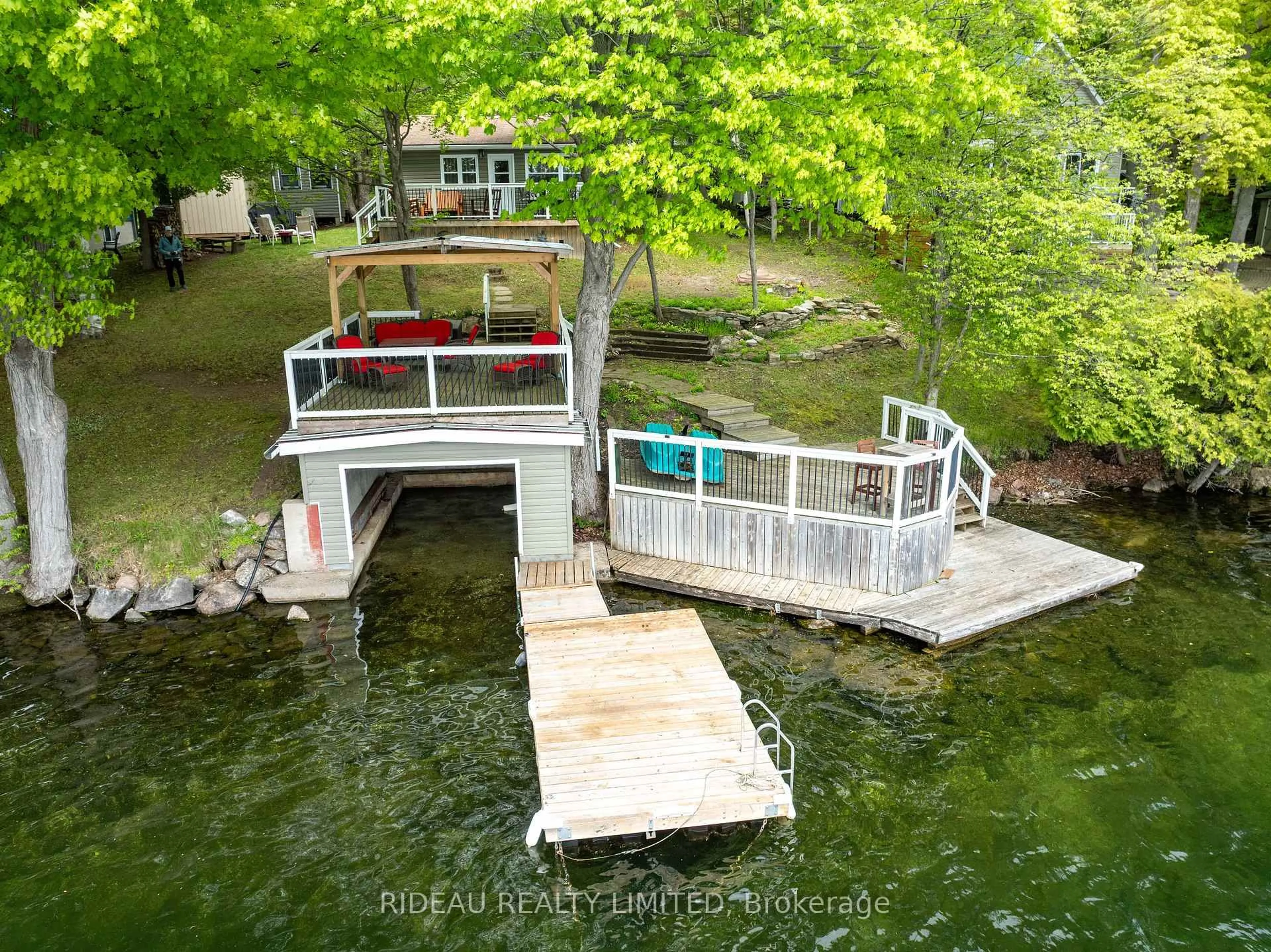 A pic from outside/outdoor area/front of a property/back of a property/a pic from drone, water/lake/river/ocean view for 66 Scott Lane, Rideau Lakes Ontario K0G 1X0