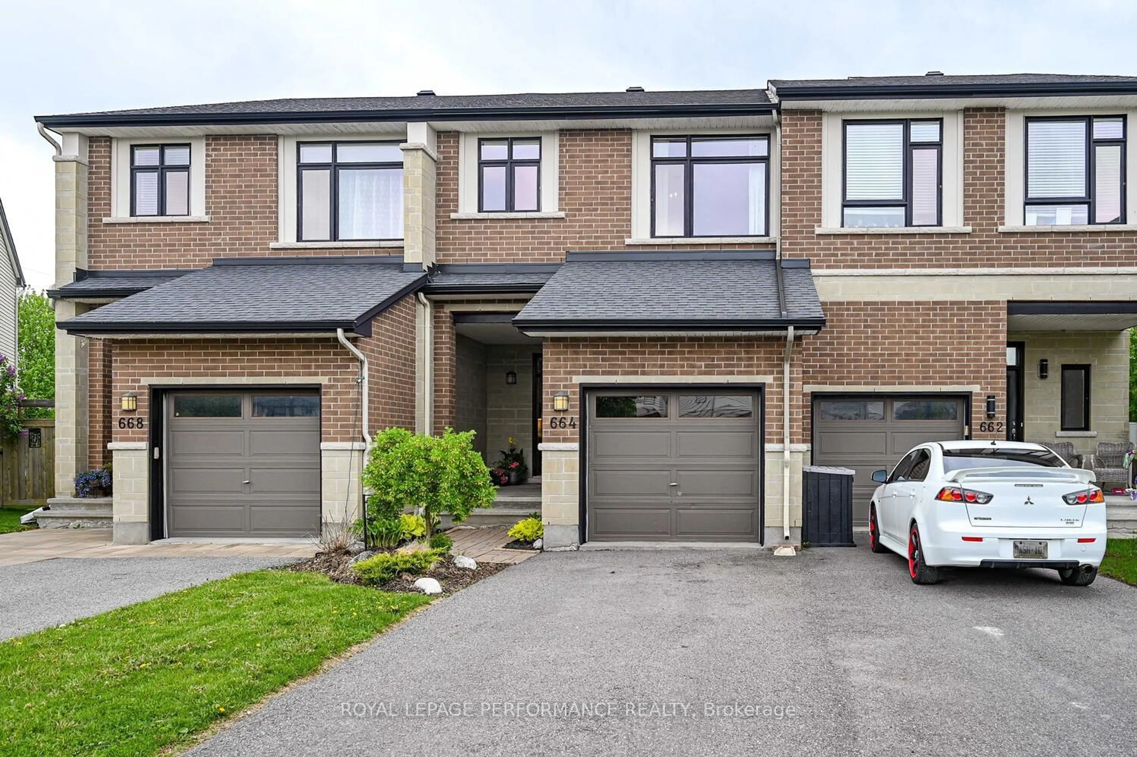 Home with brick exterior material, street for 664 Whitecliffs Ave, Ottawa Ontario K1V 2N4