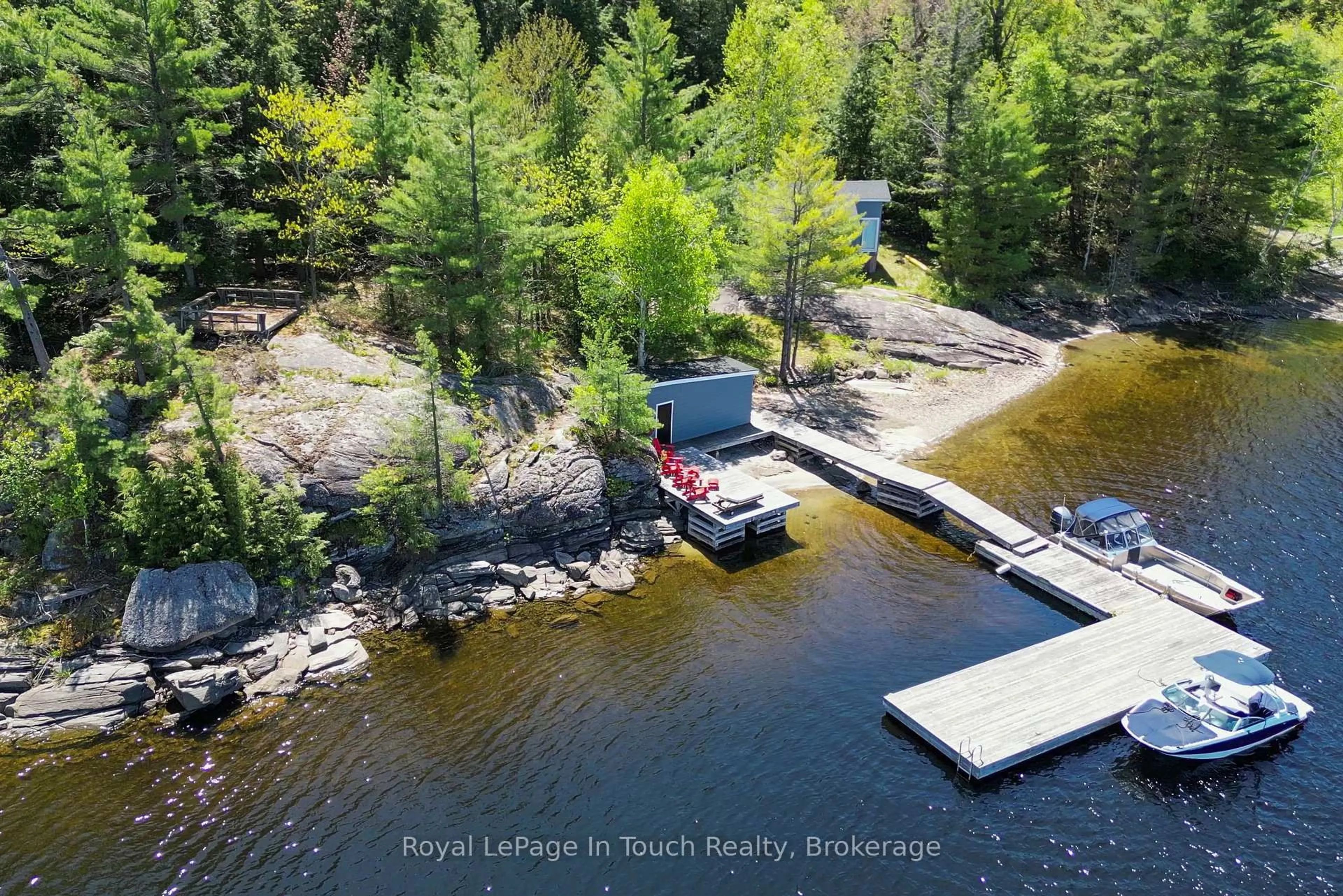 A pic from outside/outdoor area/front of a property/back of a property/a pic from drone, water/lake/river/ocean view for 15052 Georgian Bay Shore N/A, Georgian Bay Ontario P0E 1E0