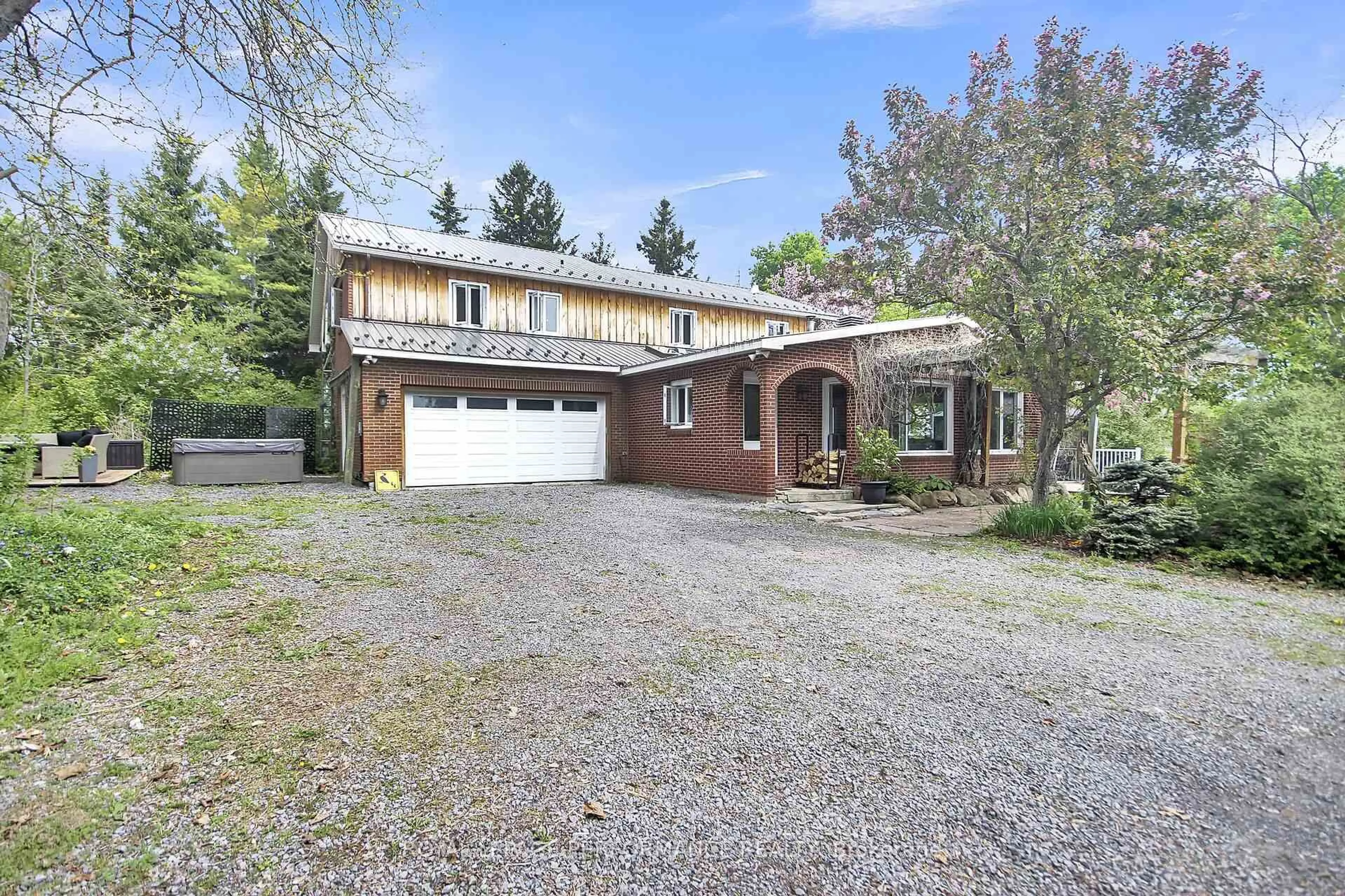A pic from outside/outdoor area/front of a property/back of a property/a pic from drone, street for 14120 County Road 13 Rd, North Stormont Ontario K0A 1R0