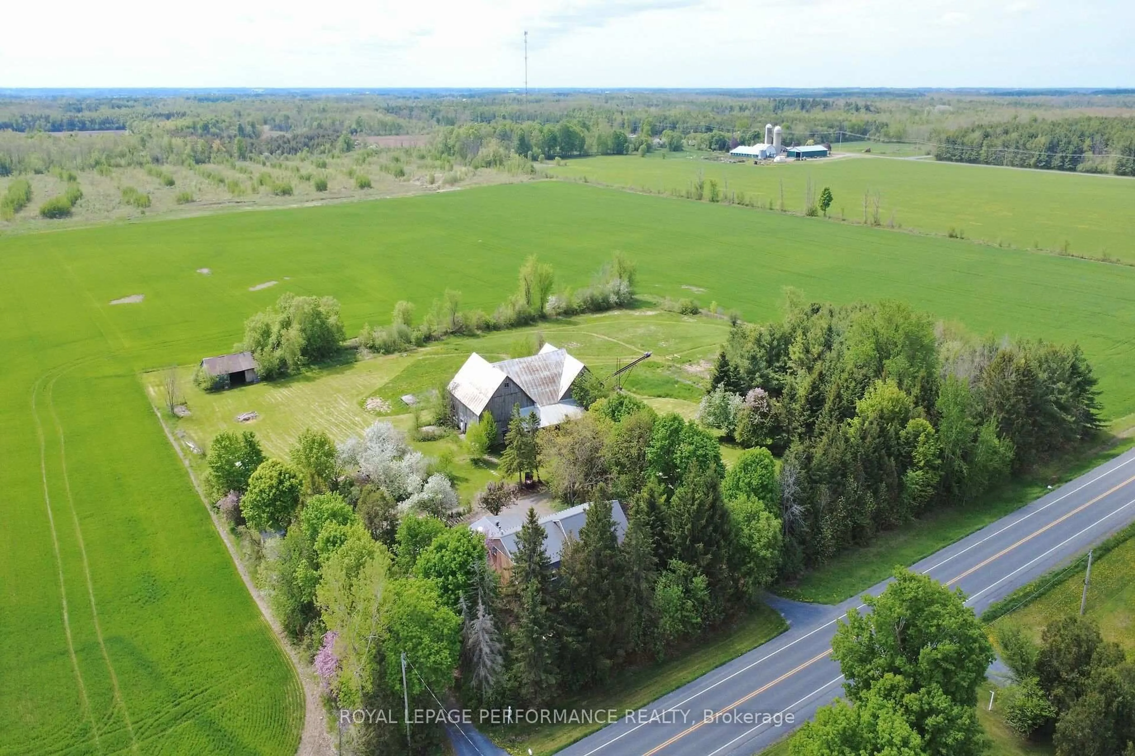 A pic from outside/outdoor area/front of a property/back of a property/a pic from drone, unknown for 14120 County Road 13 Rd, North Stormont Ontario K0A 1R0