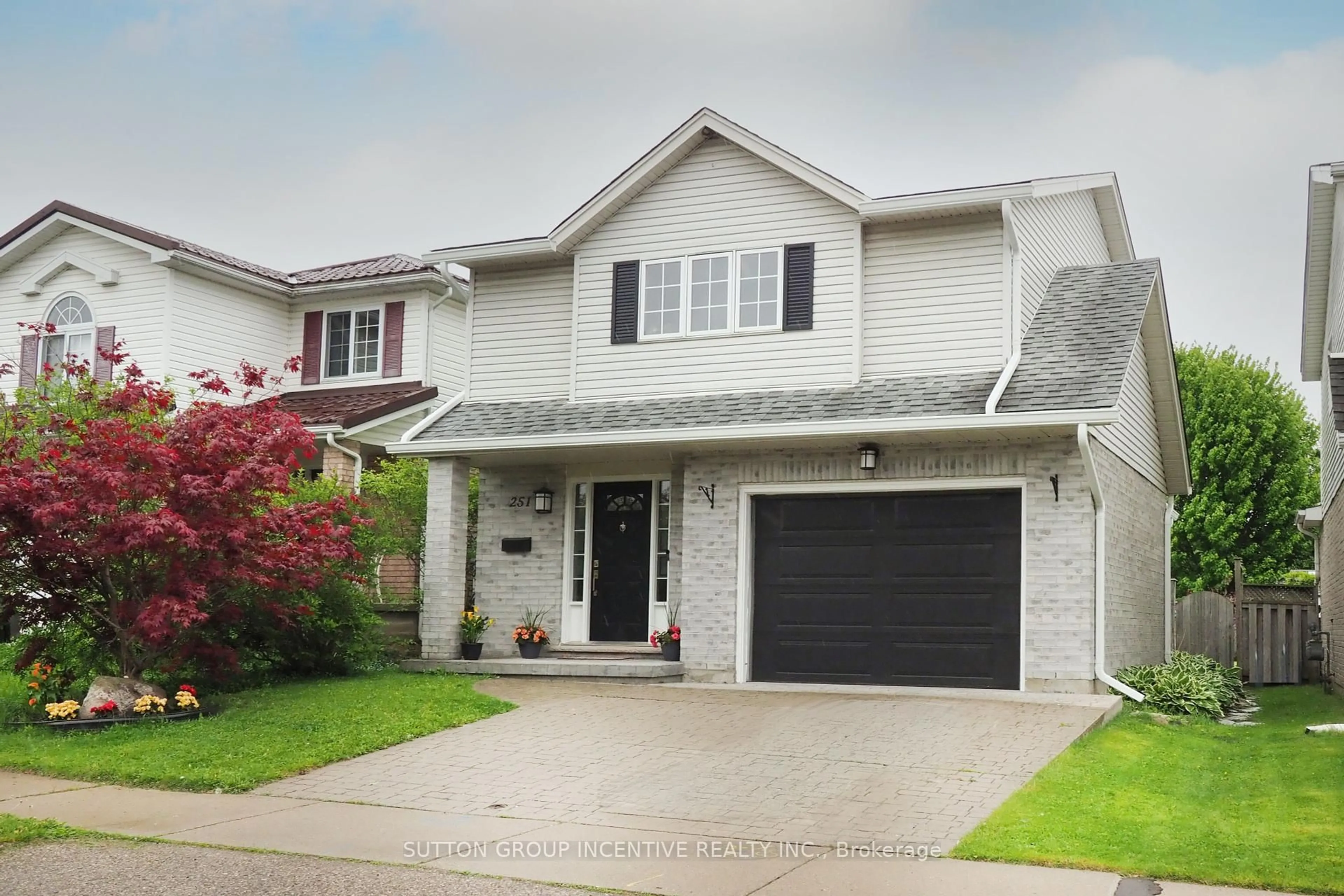 Home with vinyl exterior material, street for 251 Grey Fox Dr, Kitchener Ontario N2E 3N7