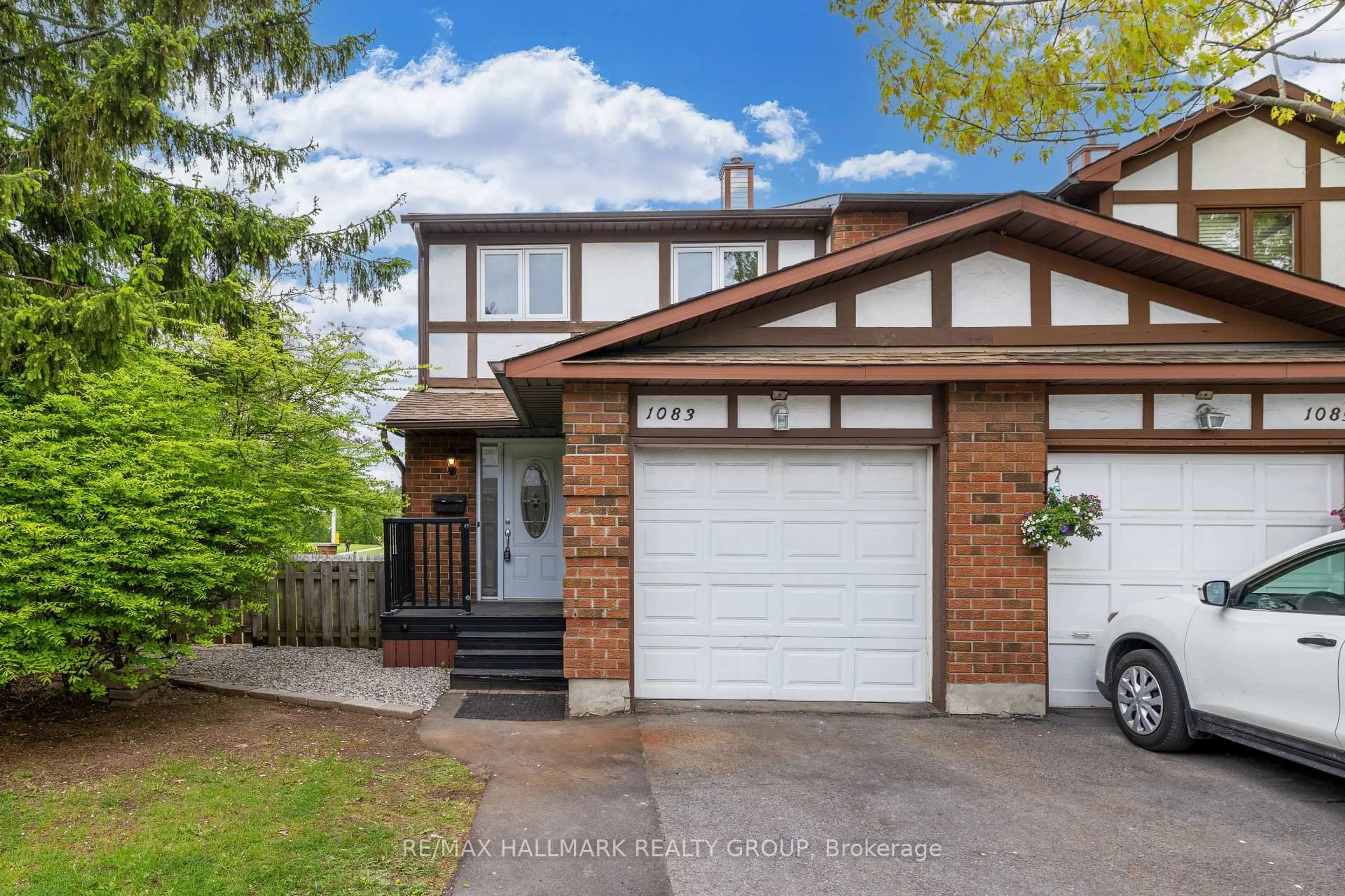 Home with brick exterior material, street for 1083 Millwood Crt, Orleans Ontario K1C 3E9