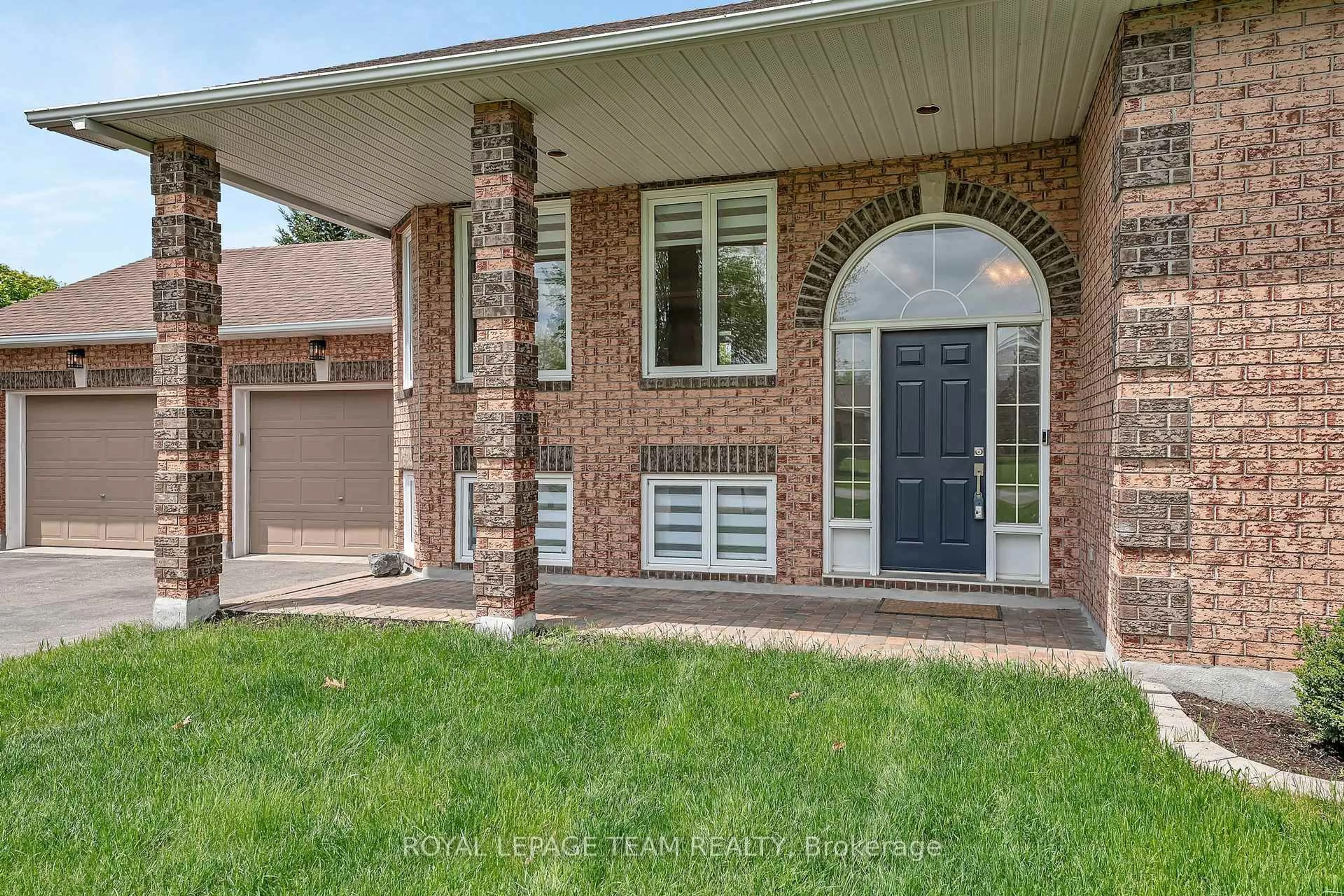Home with brick exterior material, street for 6701 Tommary Dr, Ottawa Ontario K4P 1G8