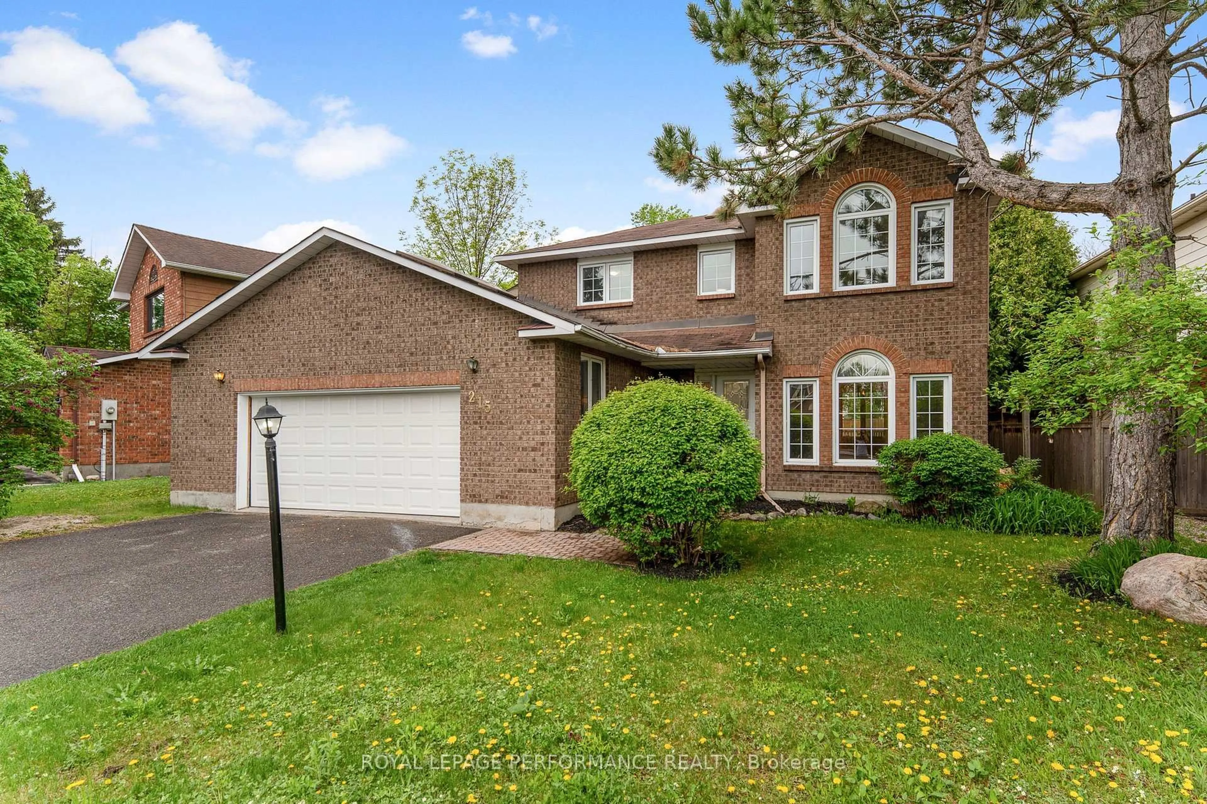 Home with brick exterior material, street for 215 Walden Dr, Ottawa Ontario K2K 2K6
