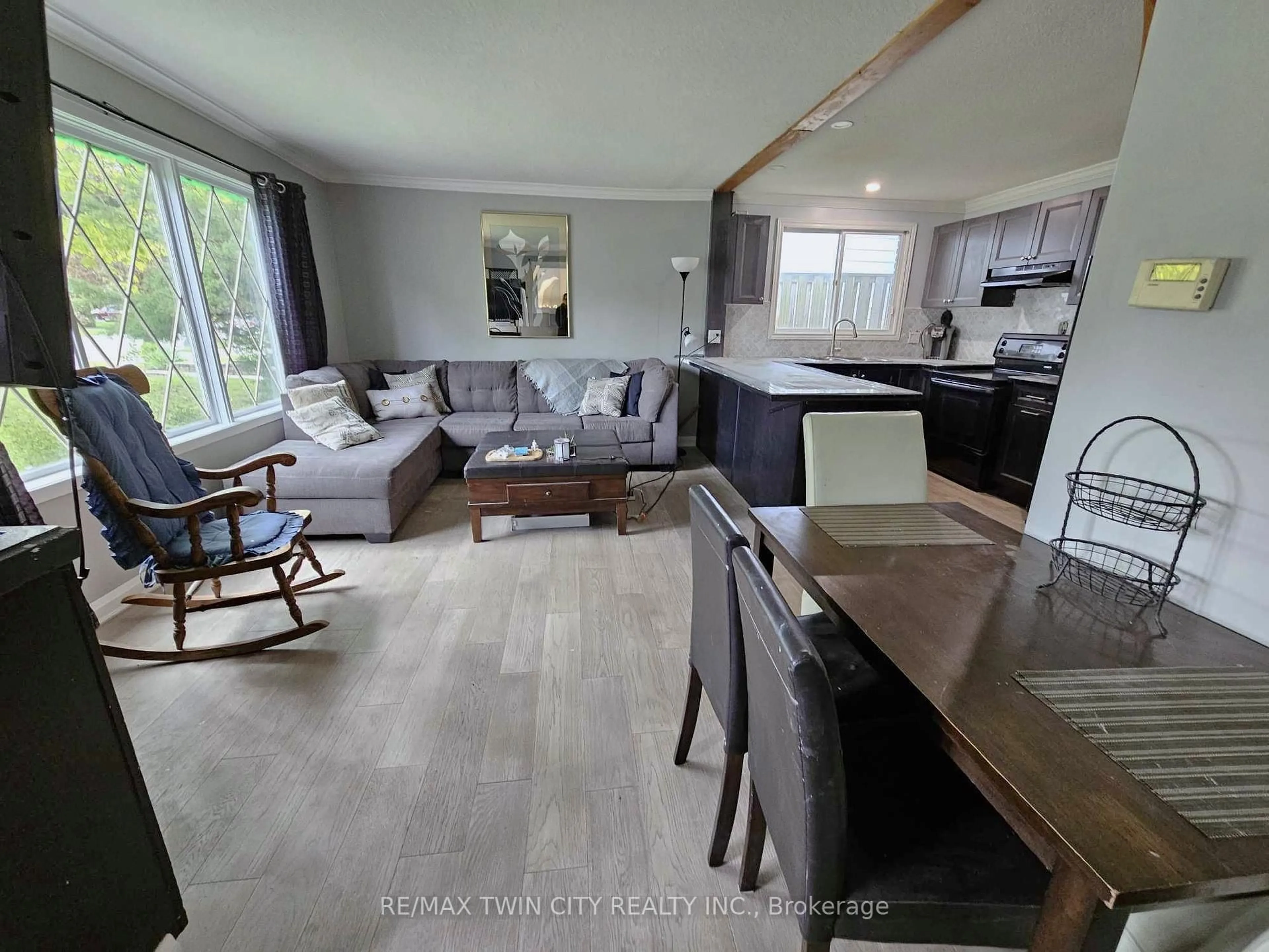Open concept kitchen, wood/laminate floor for 559 Sprucehill Ave, Waterloo Ontario N2L 4V8