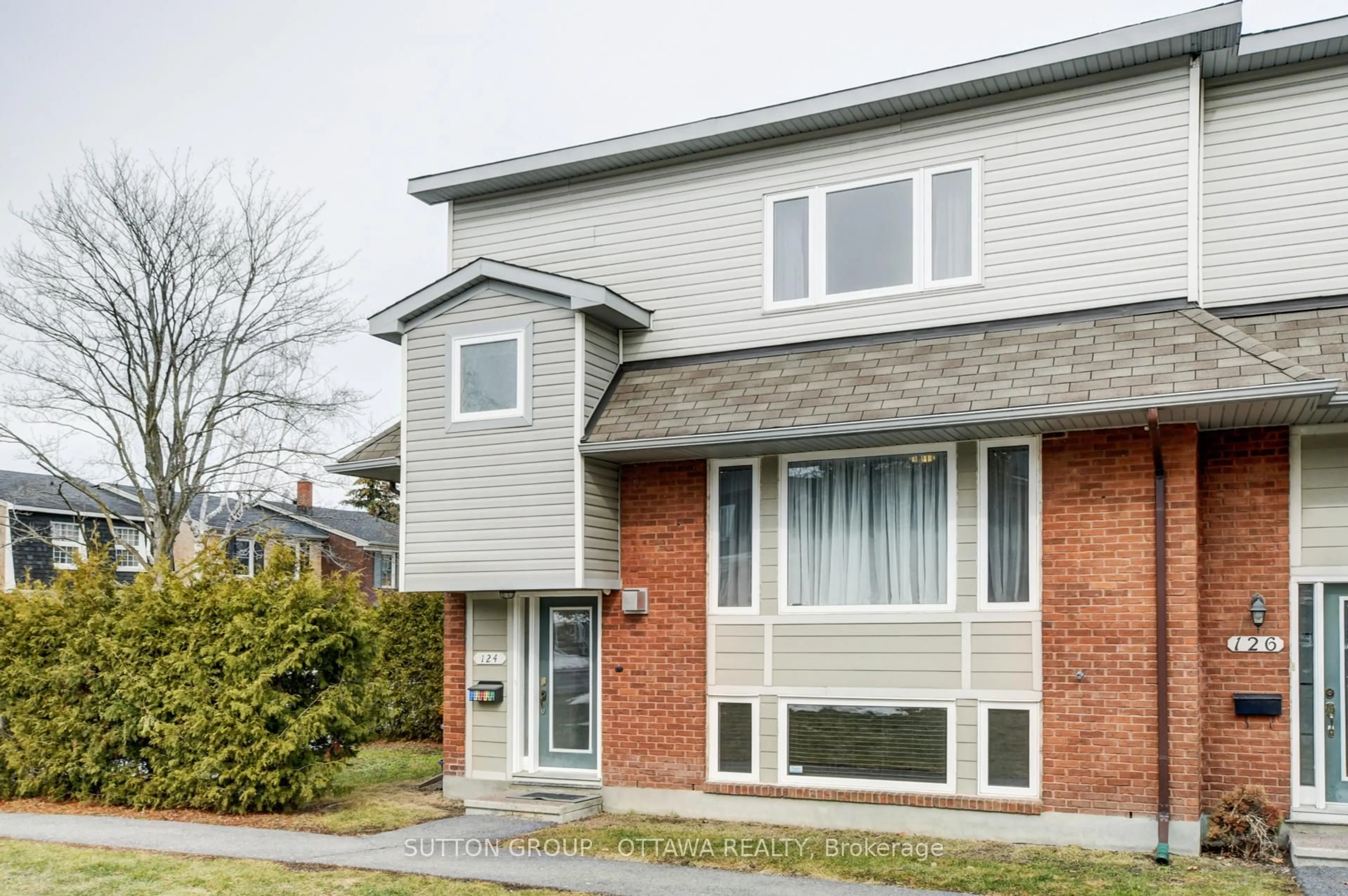 Home with brick exterior material, street for 124 MONTEREY Dr, Ottawa Ontario K2H 7A8