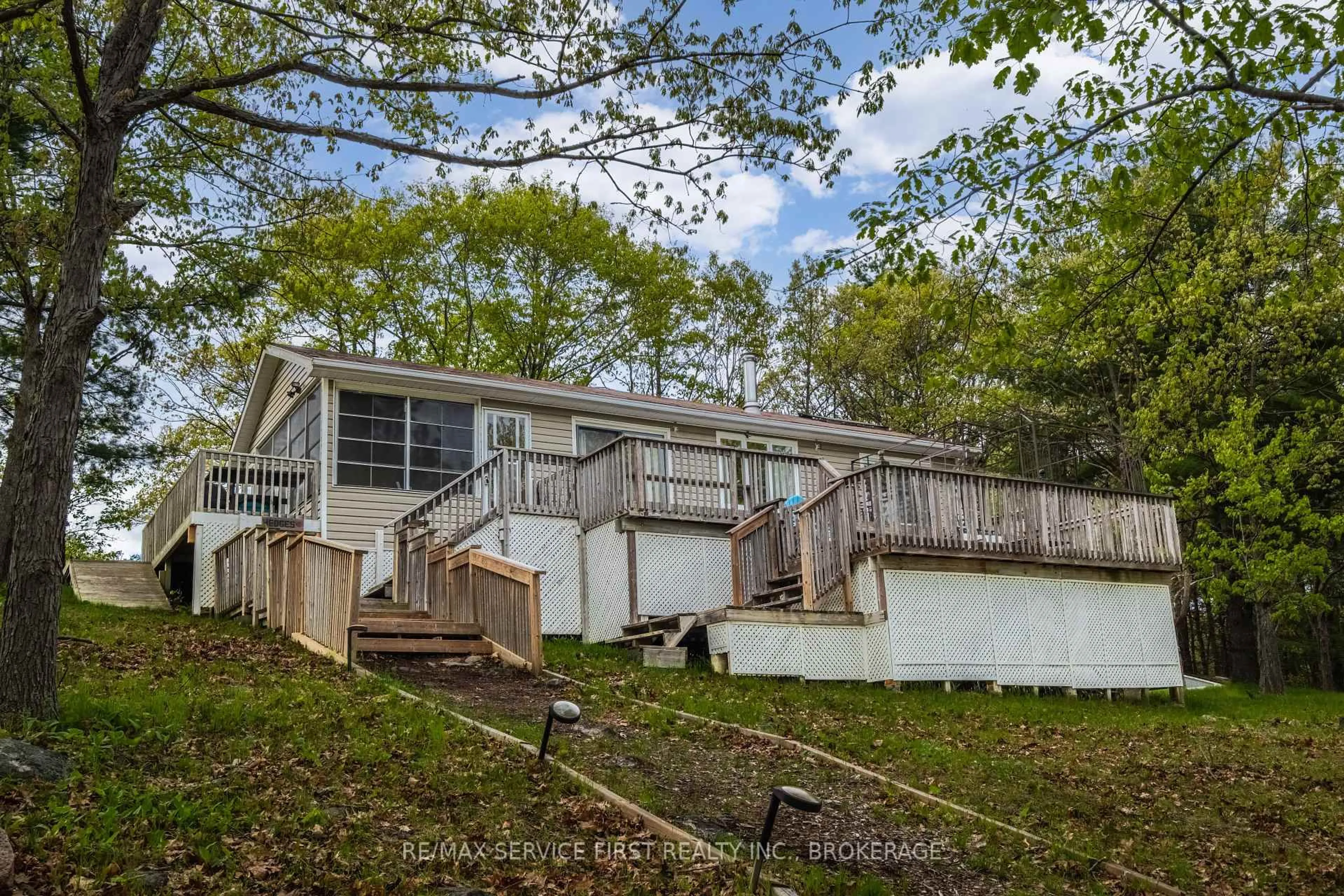 A pic from outside/outdoor area/front of a property/back of a property/a pic from drone, unknown for 5084 Sheffield Long Lake Rd, Tamworth Ontario K0K 3G0