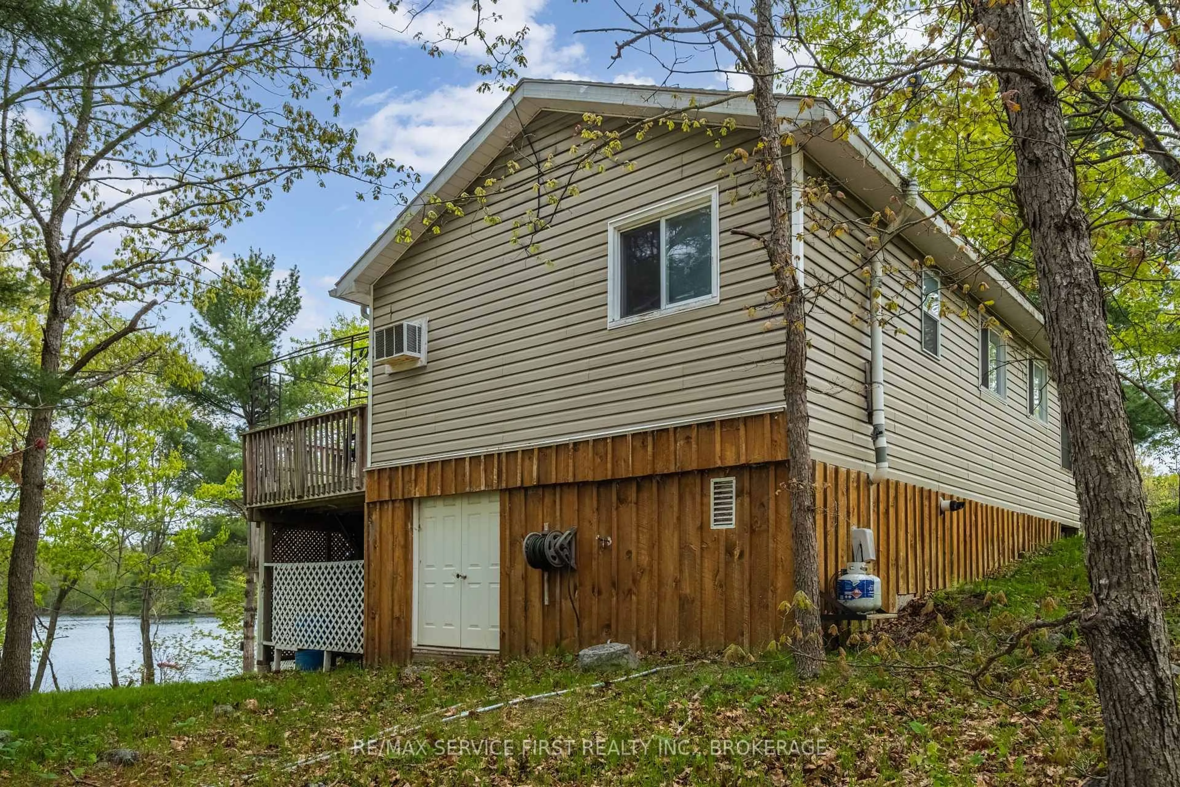 Home with vinyl exterior material, water/lake/river/ocean view for 5084 Sheffield Long Lake Rd, Tamworth Ontario K0K 3G0