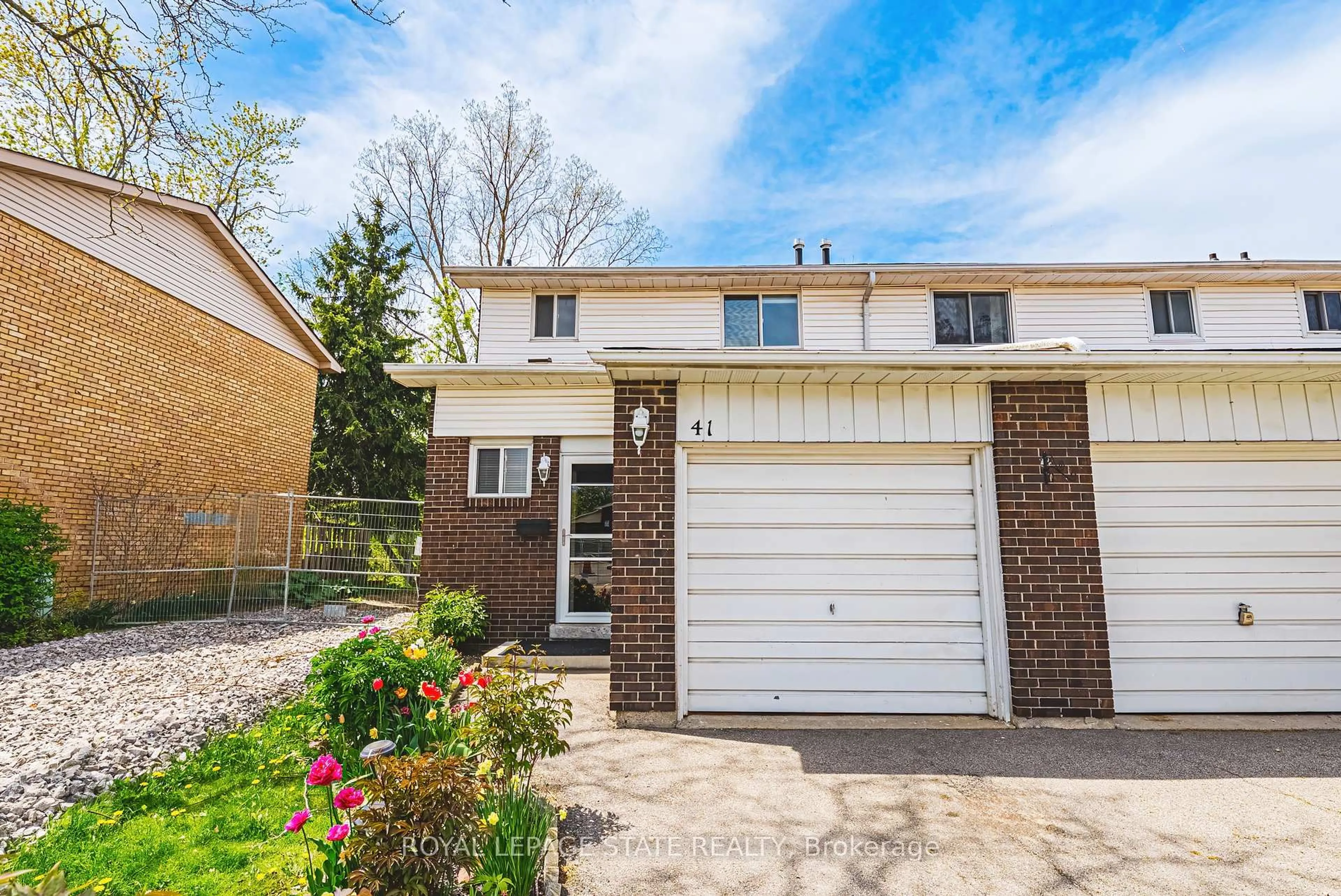 Home with brick exterior material, street for 100 Quigley Rd #41, Hamilton Ontario L8K 6J1