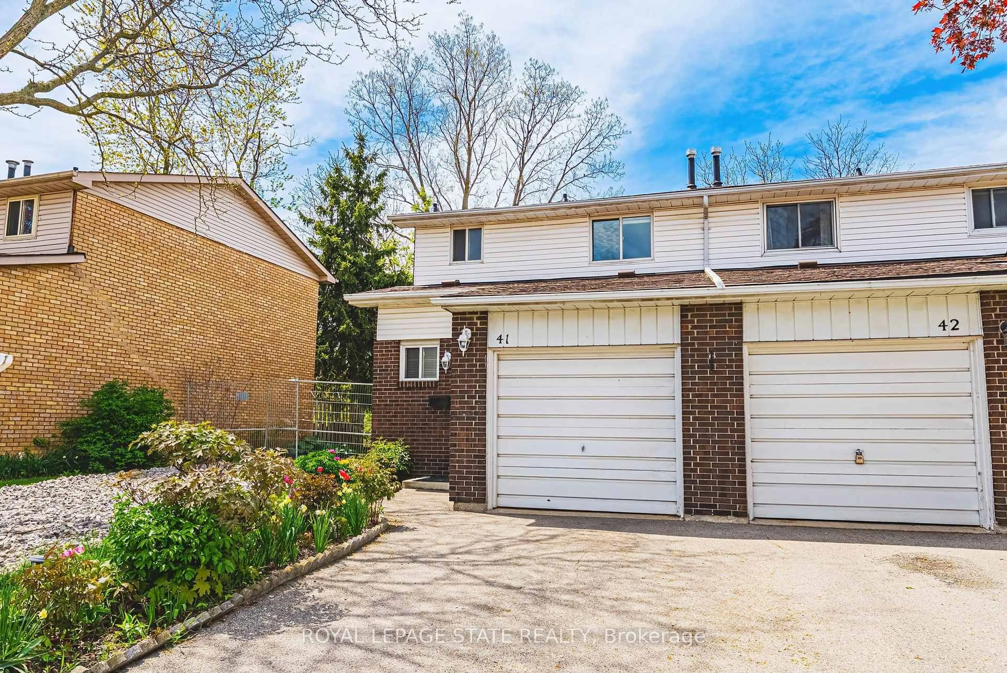Home with brick exterior material, street for 100 Quigley Rd #41, Hamilton Ontario L8K 6J1